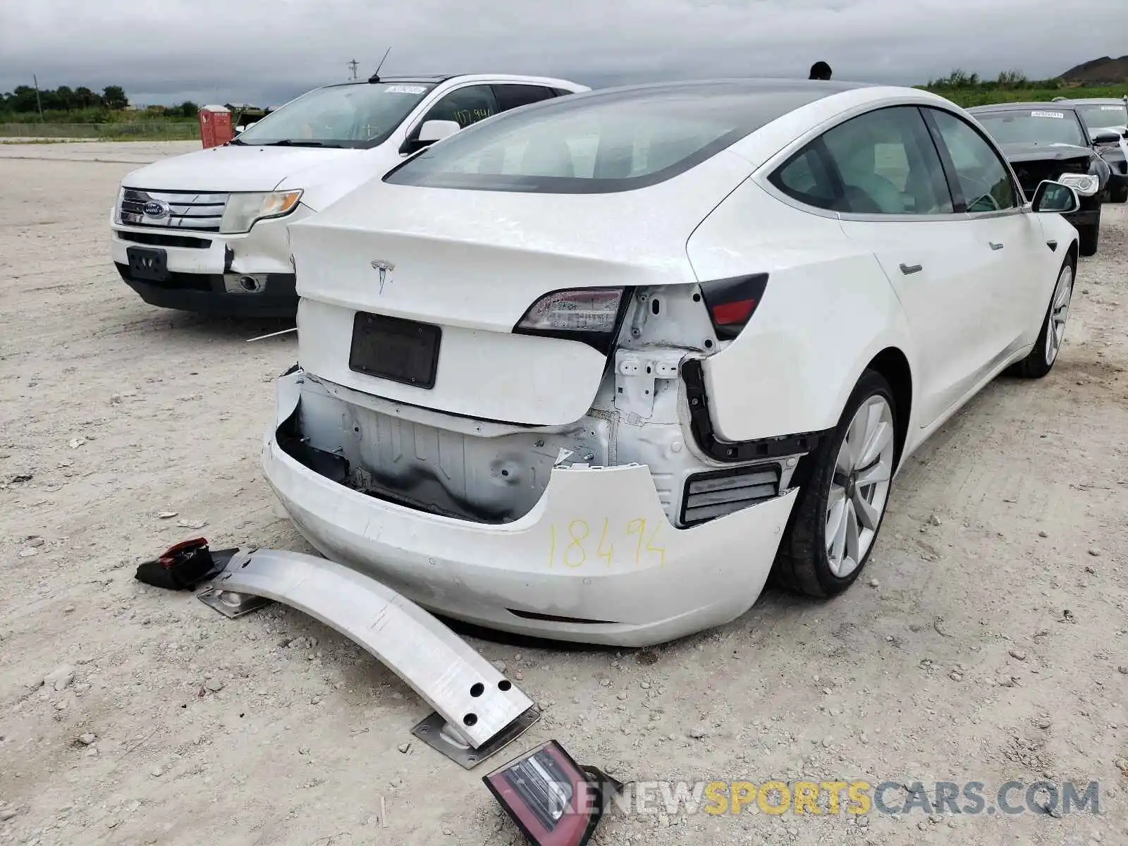 4 Photograph of a damaged car 5YJ3E1EA3LF599388 TESLA MODEL 3 2020