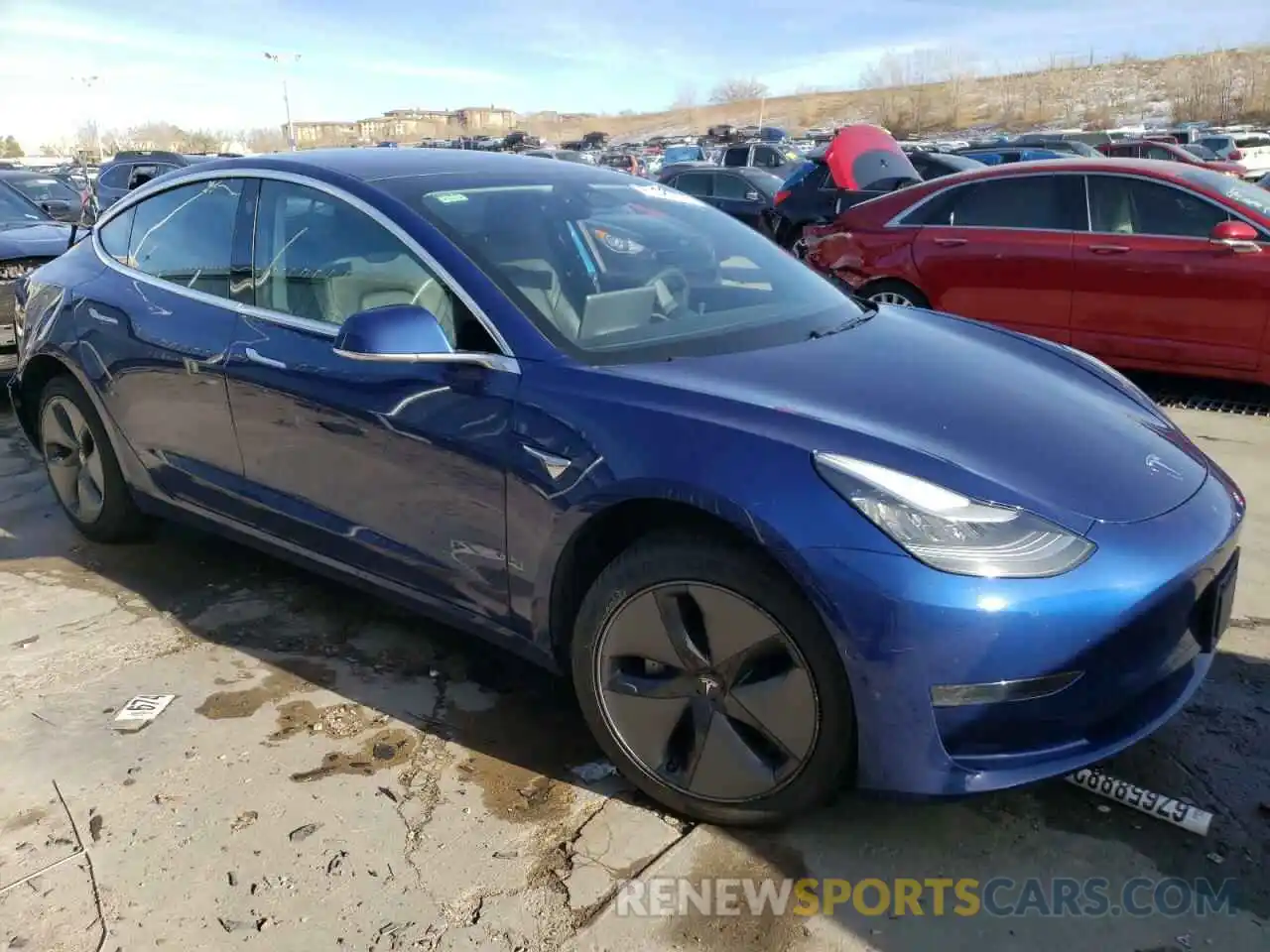 4 Photograph of a damaged car 5YJ3E1EA3LF612074 TESLA MODEL 3 2020