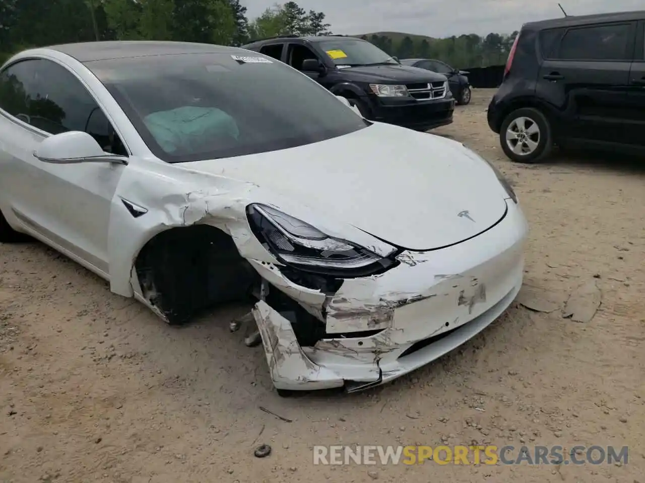 9 Photograph of a damaged car 5YJ3E1EA3LF645379 TESLA MODEL 3 2020