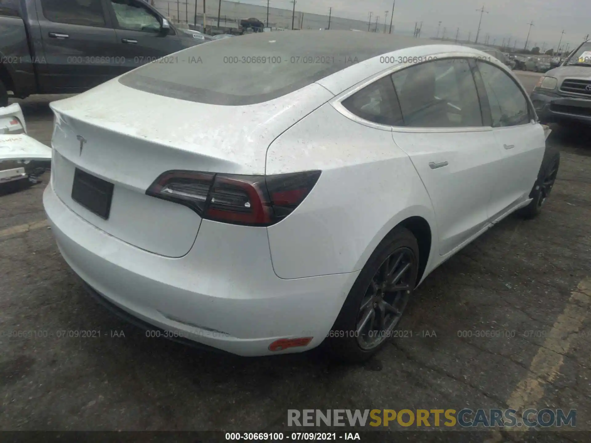 4 Photograph of a damaged car 5YJ3E1EA3LF659363 TESLA MODEL 3 2020