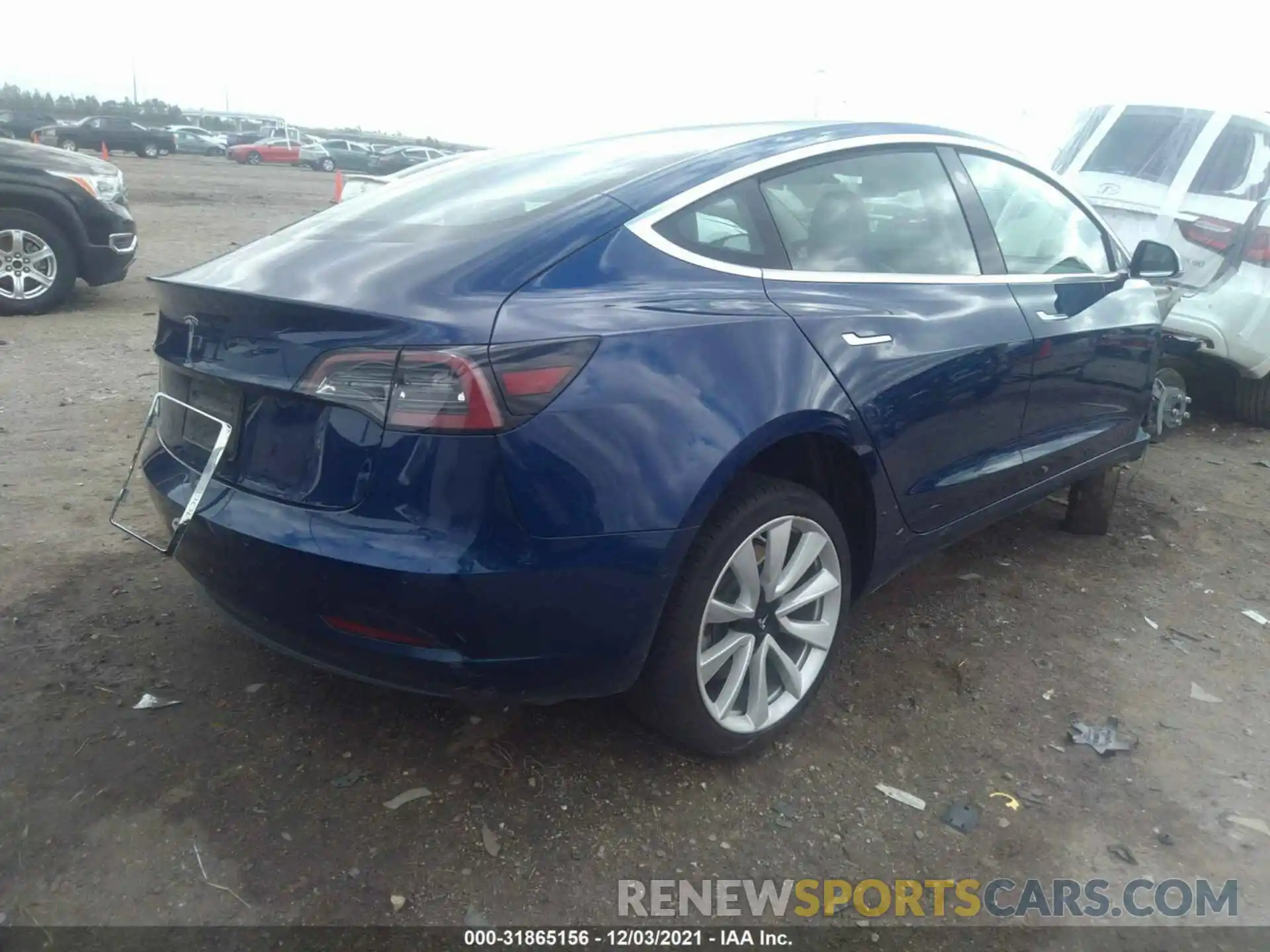 4 Photograph of a damaged car 5YJ3E1EA3LF661310 TESLA MODEL 3 2020