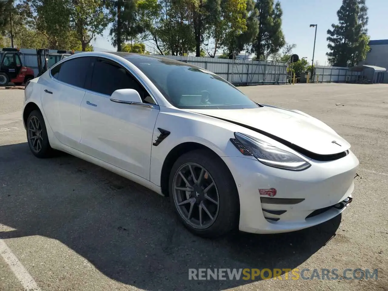 4 Photograph of a damaged car 5YJ3E1EA3LF703717 TESLA MODEL 3 2020