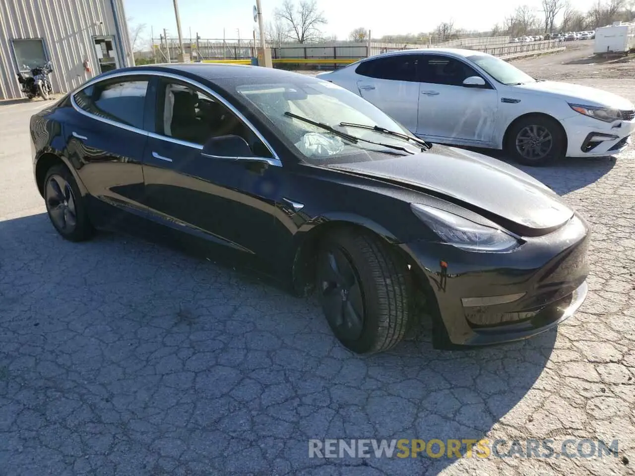 4 Photograph of a damaged car 5YJ3E1EA3LF736491 TESLA MODEL 3 2020