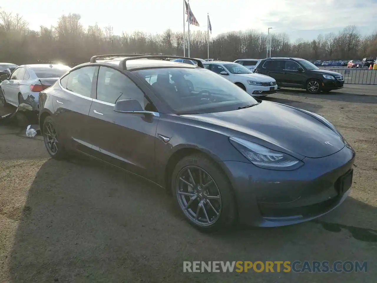 4 Photograph of a damaged car 5YJ3E1EA3LF739309 TESLA MODEL 3 2020