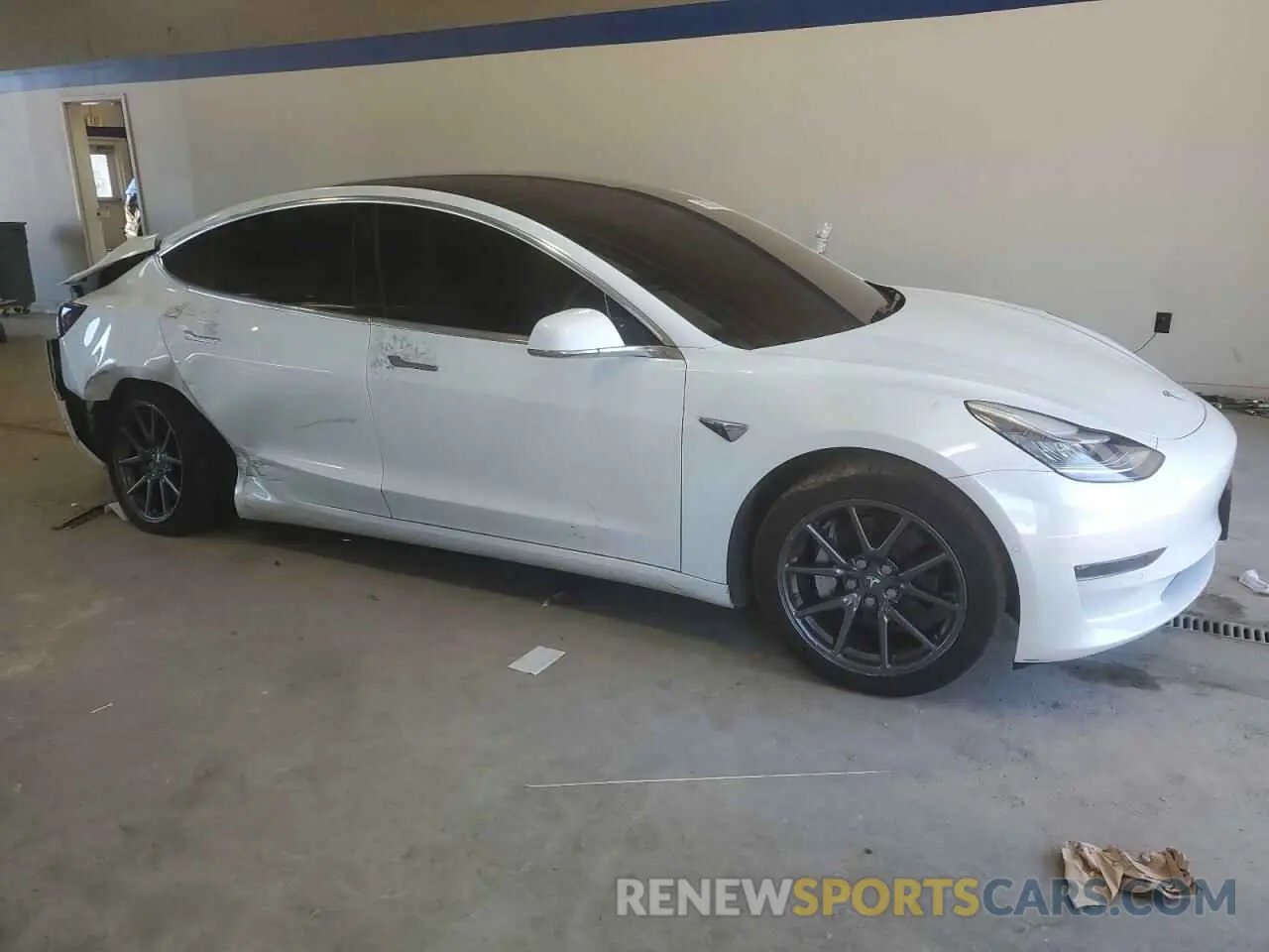 4 Photograph of a damaged car 5YJ3E1EA3LF741075 TESLA MODEL 3 2020