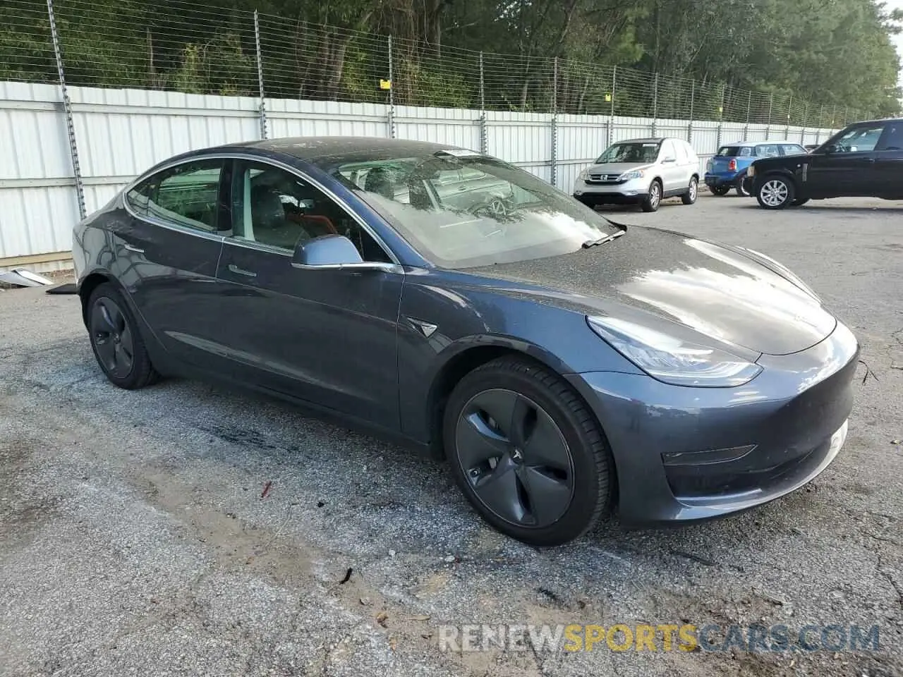 4 Photograph of a damaged car 5YJ3E1EA3LF792222 TESLA MODEL 3 2020