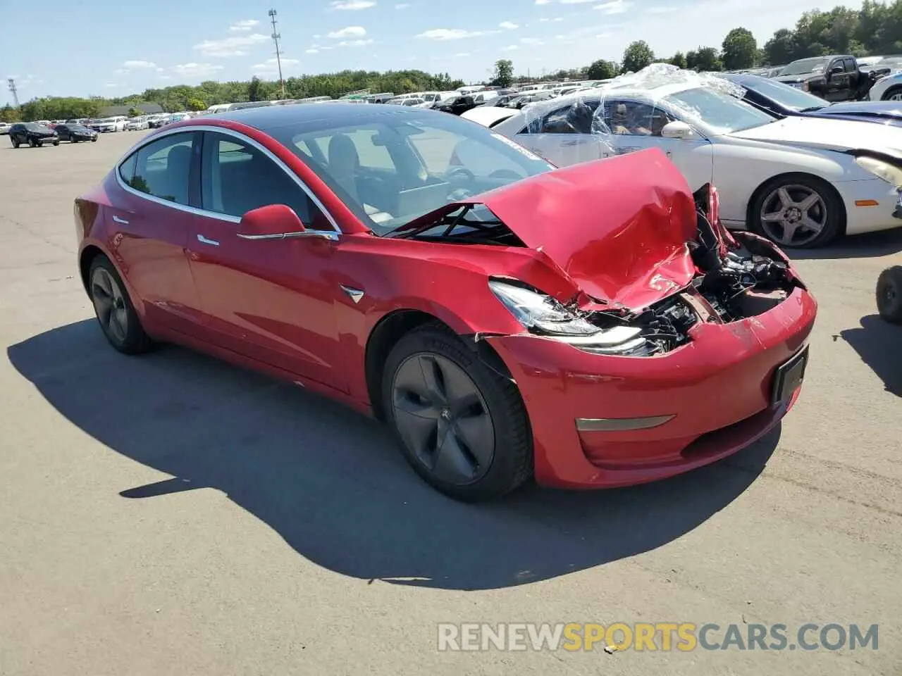4 Photograph of a damaged car 5YJ3E1EA3LF792348 TESLA MODEL 3 2020