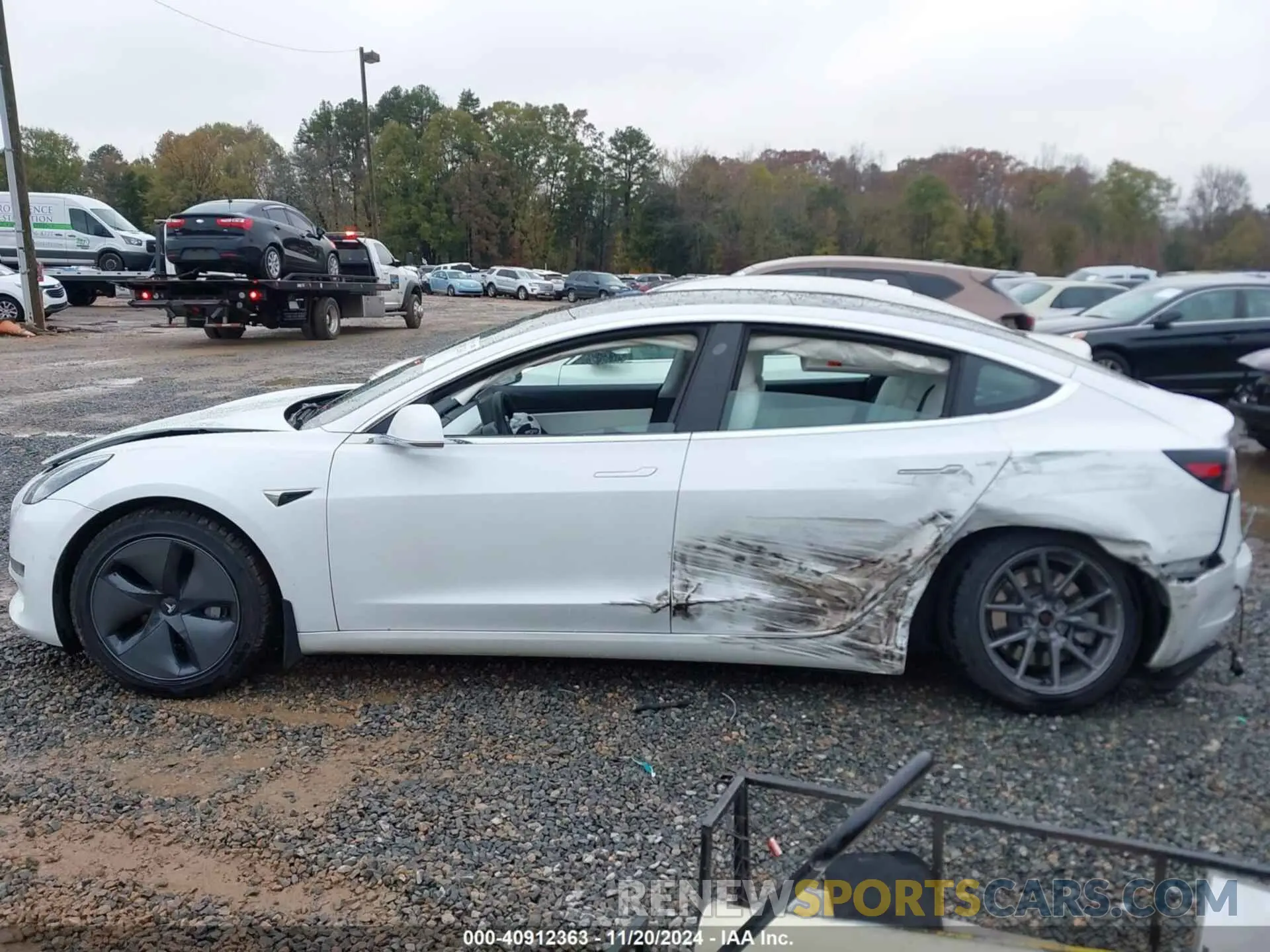 14 Photograph of a damaged car 5YJ3E1EA3LF793273 TESLA MODEL 3 2020