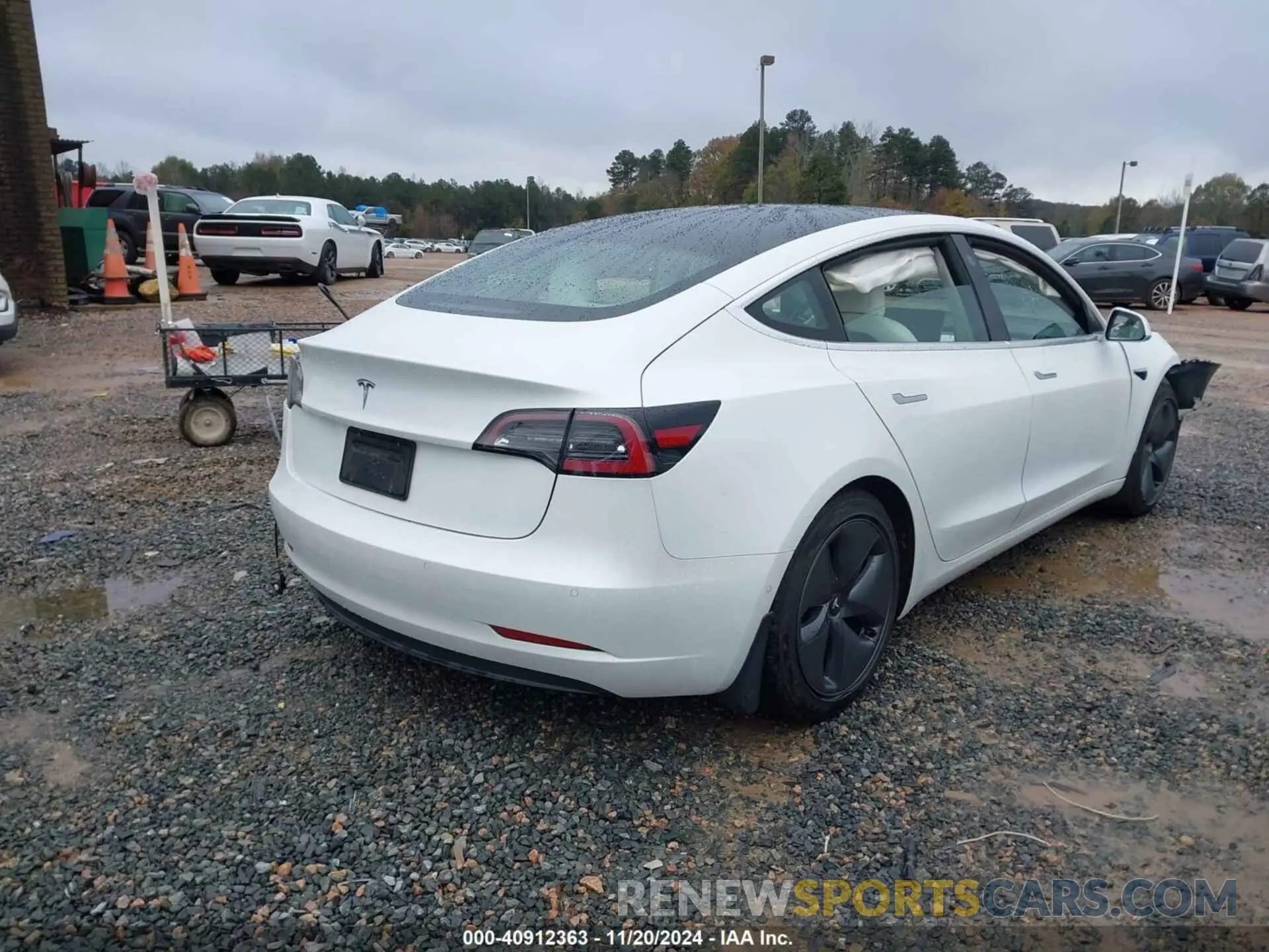 4 Photograph of a damaged car 5YJ3E1EA3LF793273 TESLA MODEL 3 2020