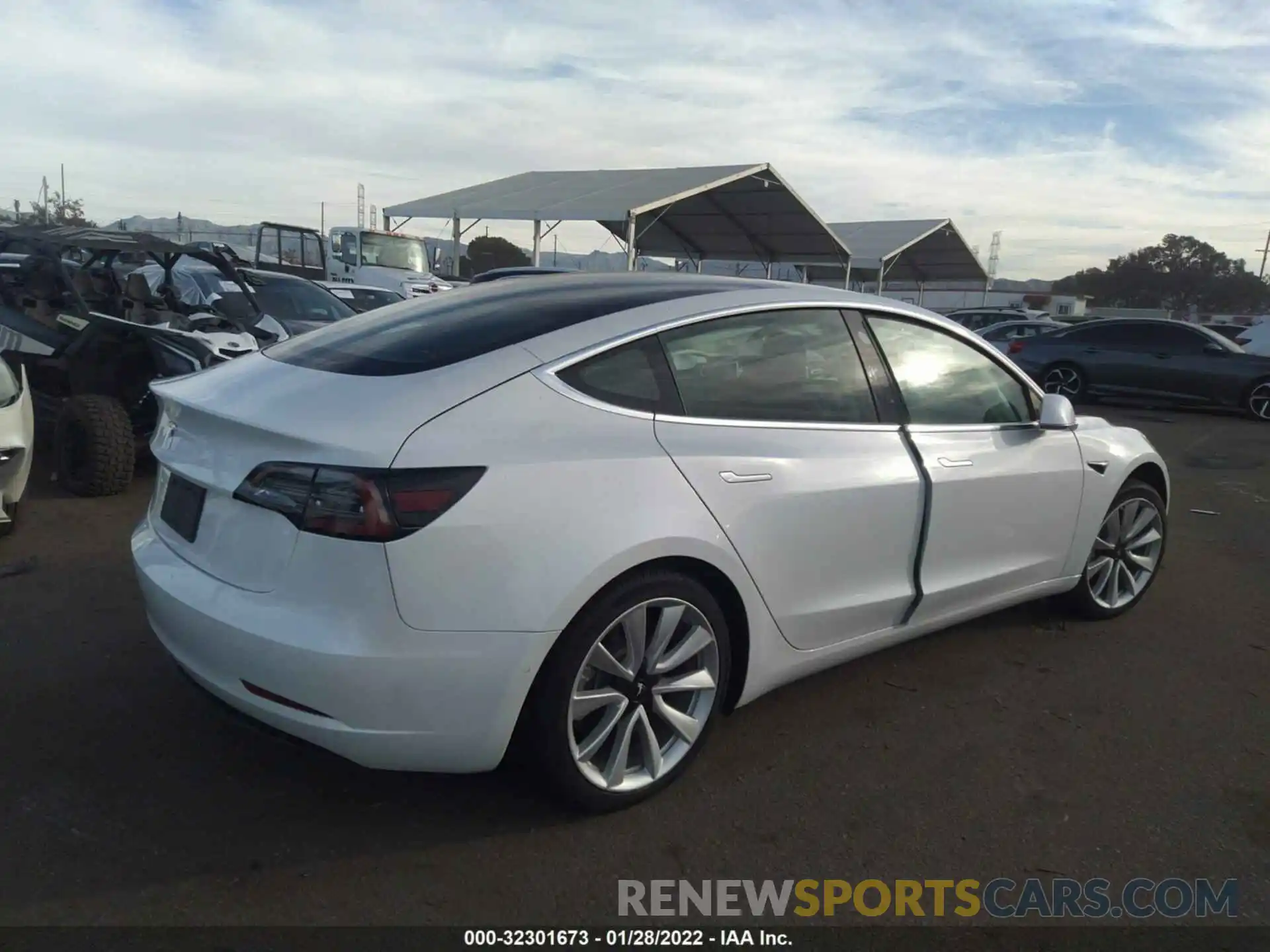 4 Photograph of a damaged car 5YJ3E1EA3LF797503 TESLA MODEL 3 2020