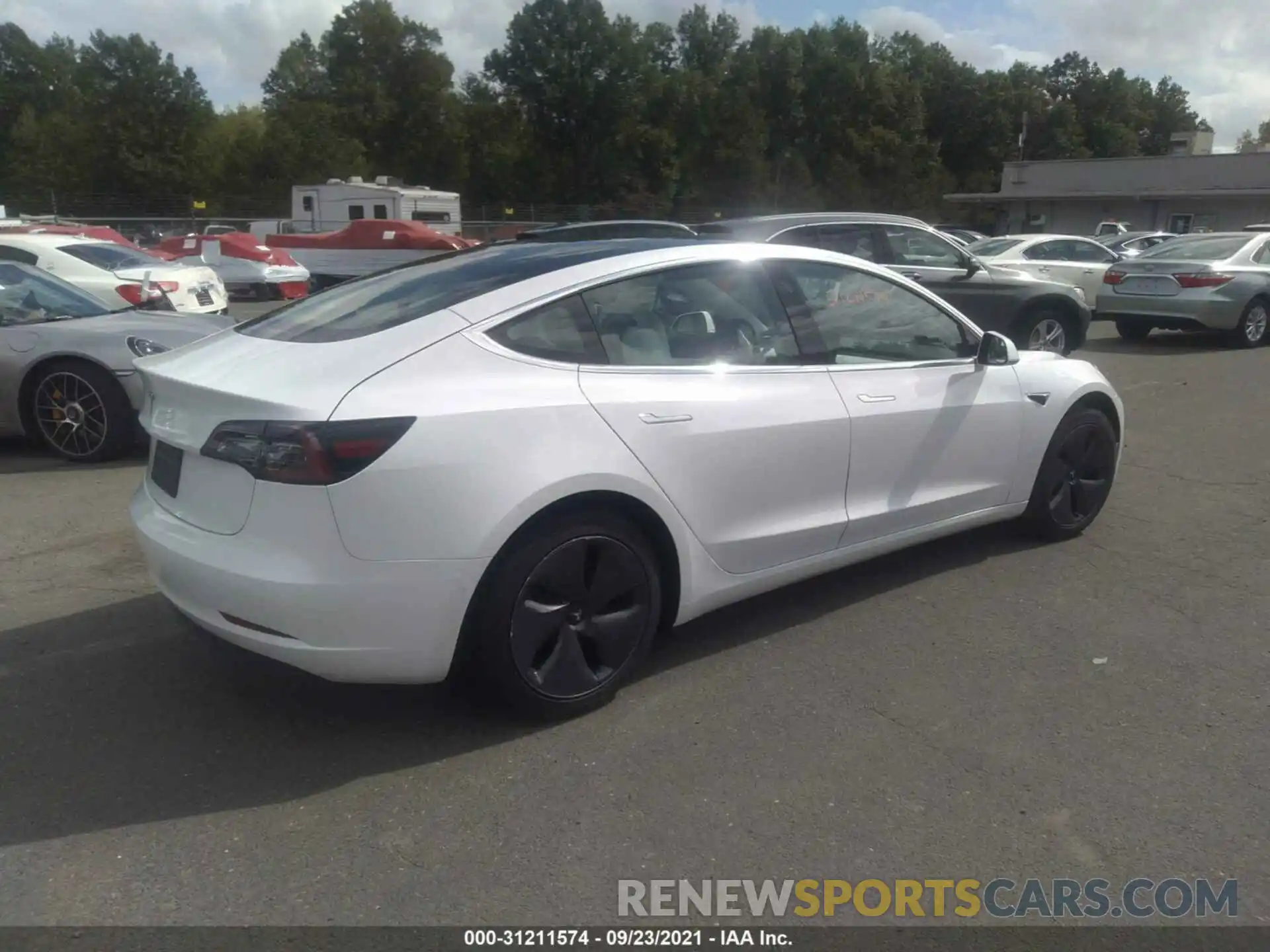 4 Photograph of a damaged car 5YJ3E1EA3LF797744 TESLA MODEL 3 2020