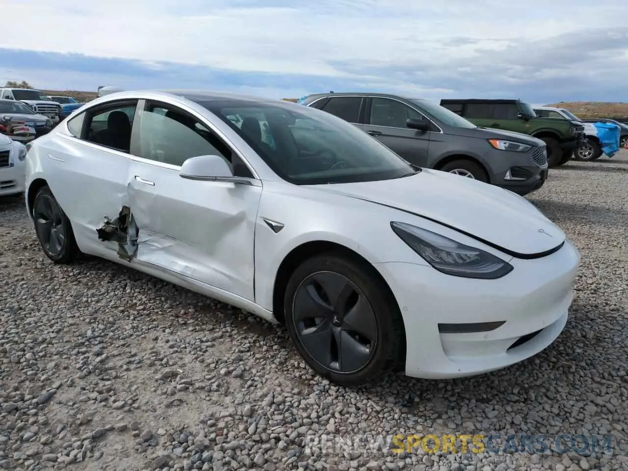 4 Photograph of a damaged car 5YJ3E1EA3LF800710 TESLA MODEL 3 2020
