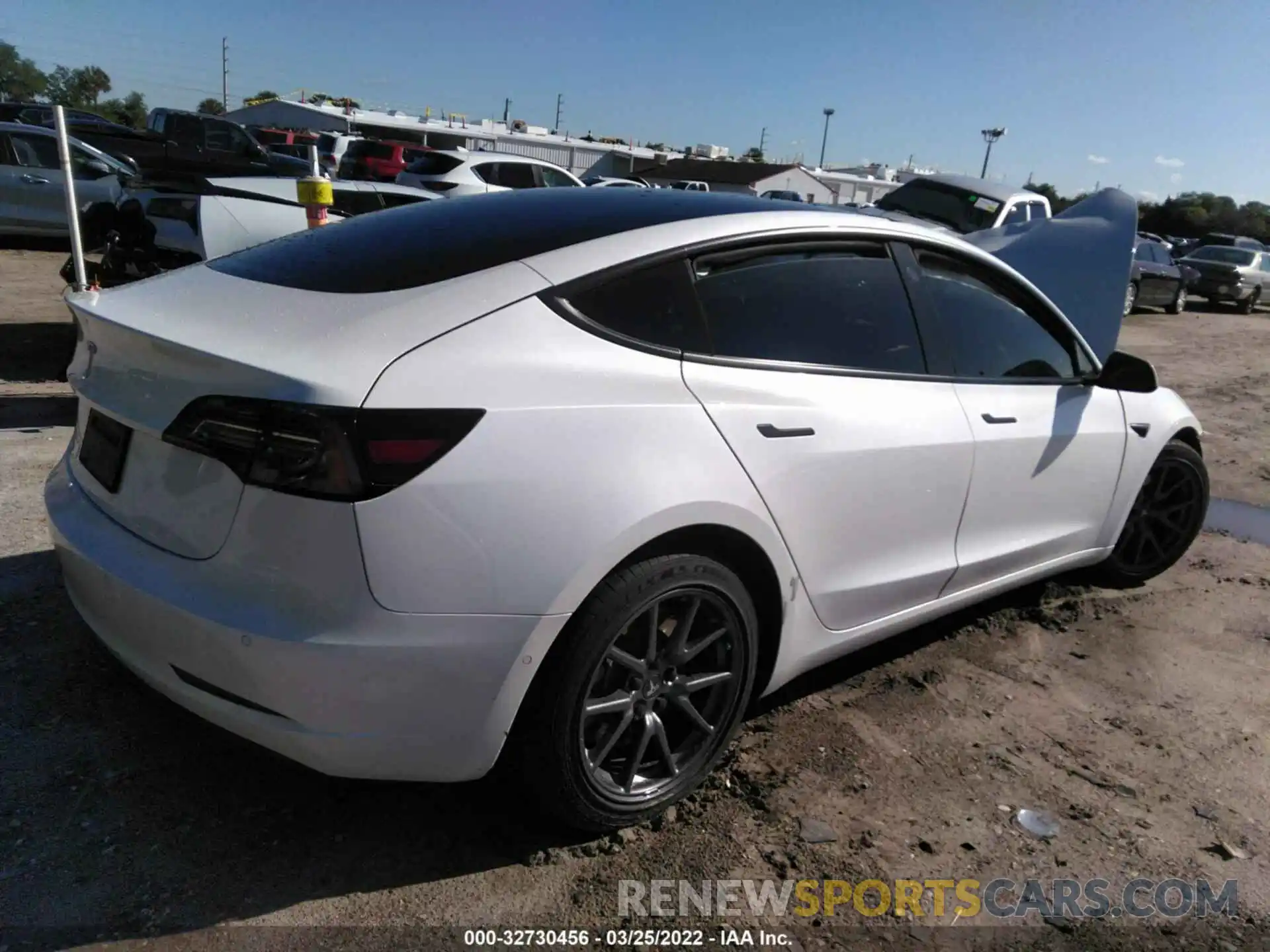 4 Photograph of a damaged car 5YJ3E1EA3LF802568 TESLA MODEL 3 2020