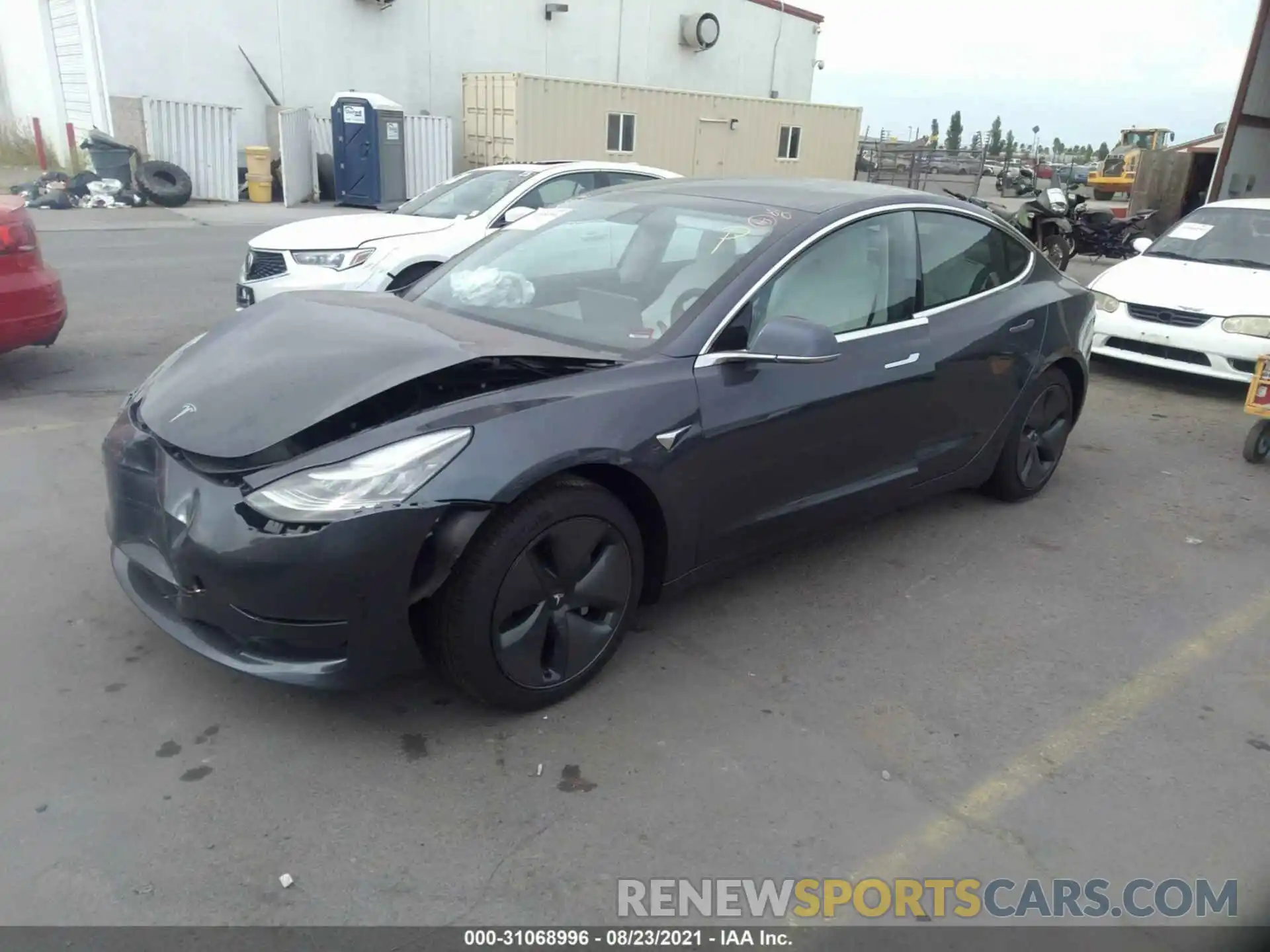 2 Photograph of a damaged car 5YJ3E1EA3LF808080 TESLA MODEL 3 2020