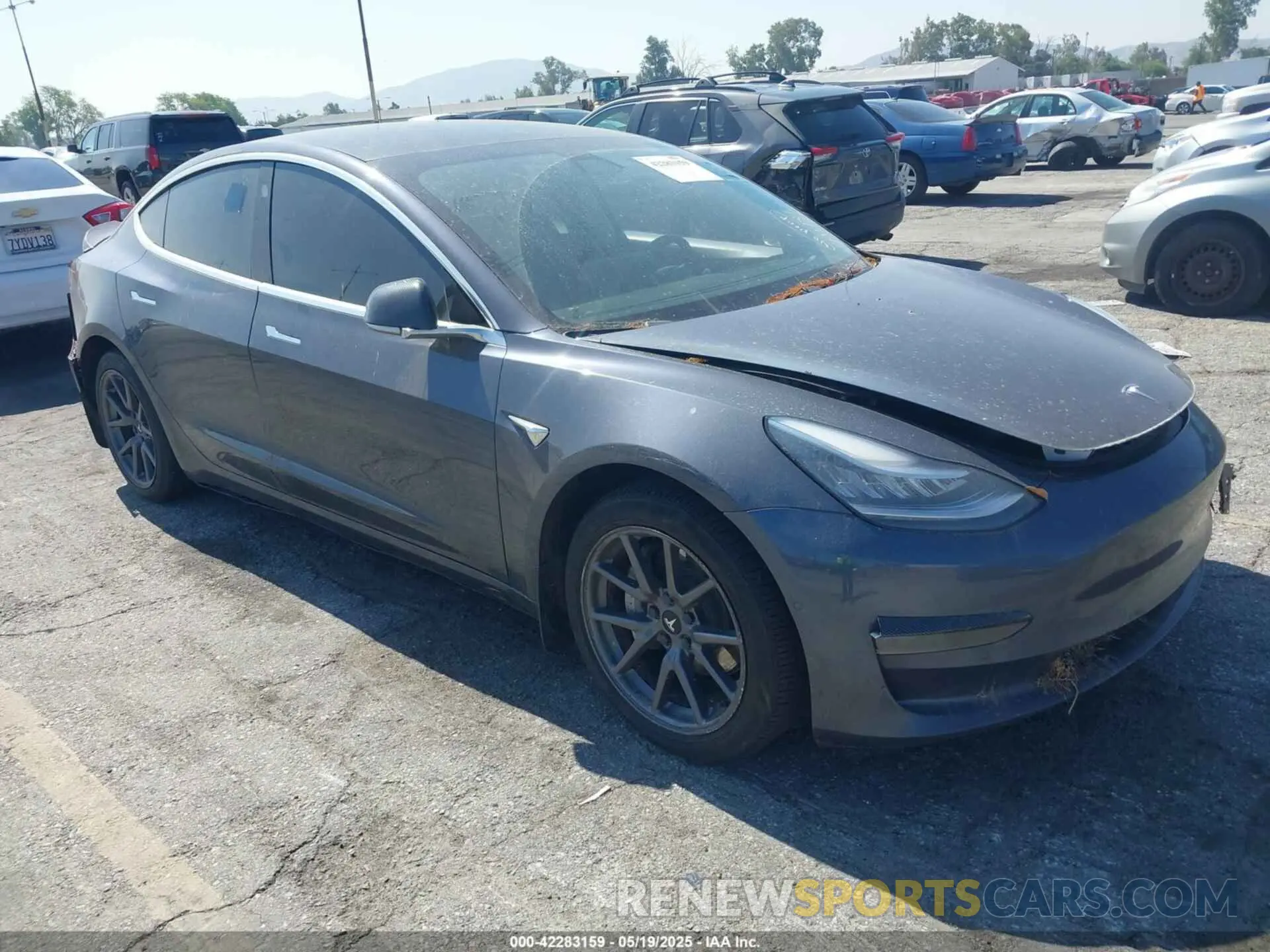 1 Photograph of a damaged car 5YJ3E1EA4LF597181 TESLA MODEL 3 2020
