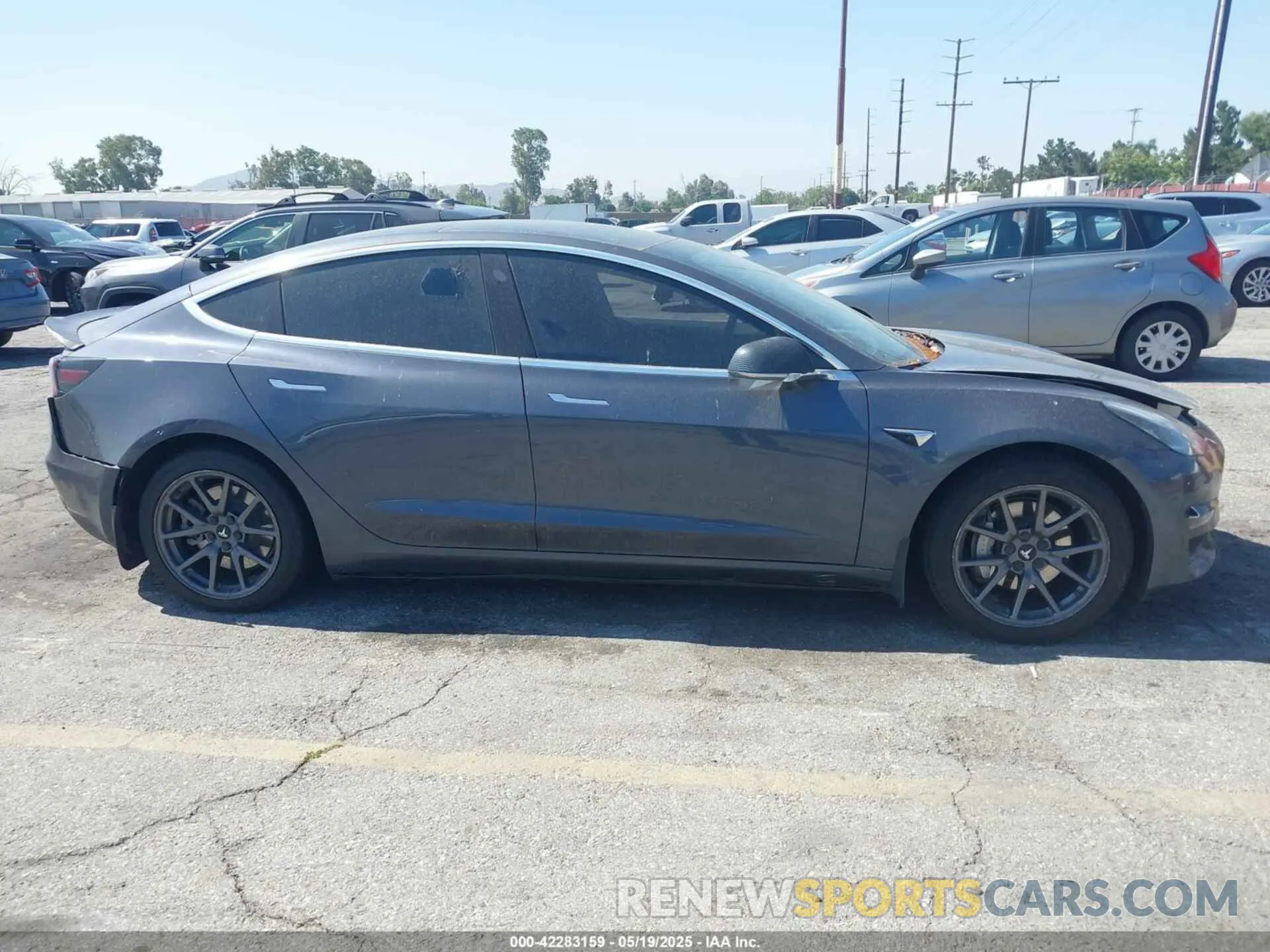 12 Photograph of a damaged car 5YJ3E1EA4LF597181 TESLA MODEL 3 2020
