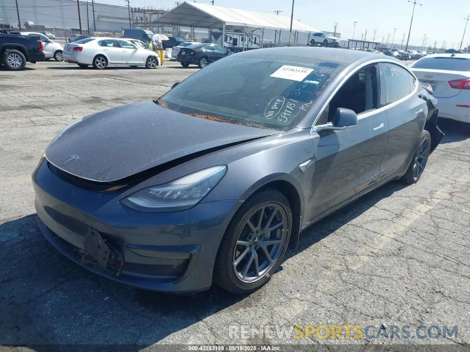 2 Photograph of a damaged car 5YJ3E1EA4LF597181 TESLA MODEL 3 2020