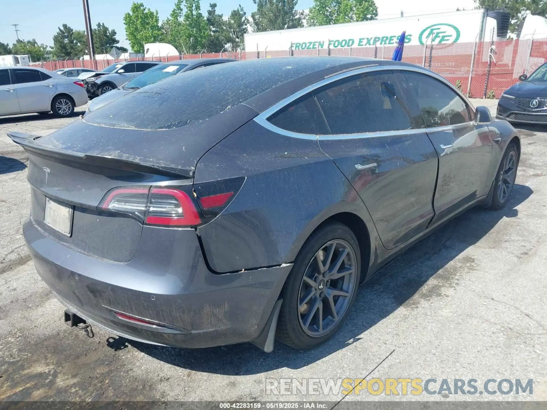 4 Photograph of a damaged car 5YJ3E1EA4LF597181 TESLA MODEL 3 2020