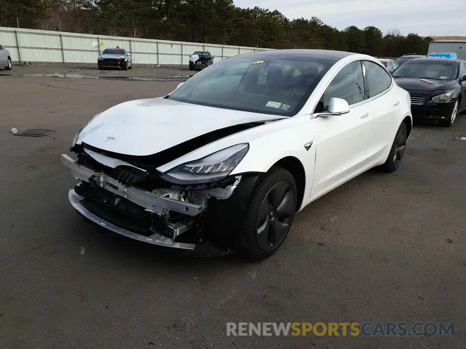 2 Photograph of a damaged car 5YJ3E1EA4LF597858 TESLA MODEL 3 2020