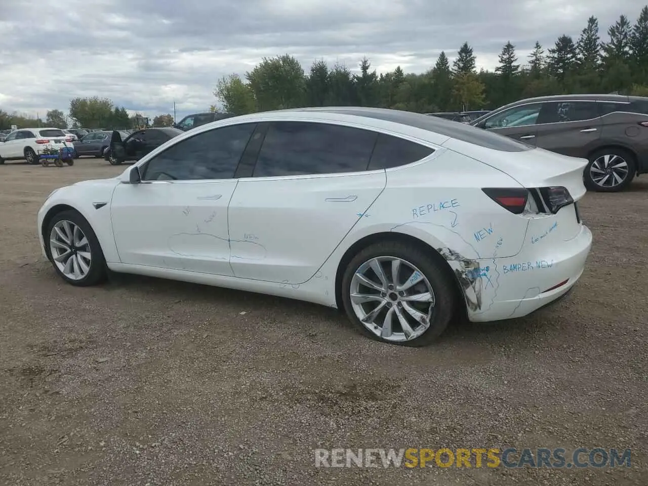 2 Photograph of a damaged car 5YJ3E1EA4LF609474 TESLA MODEL 3 2020
