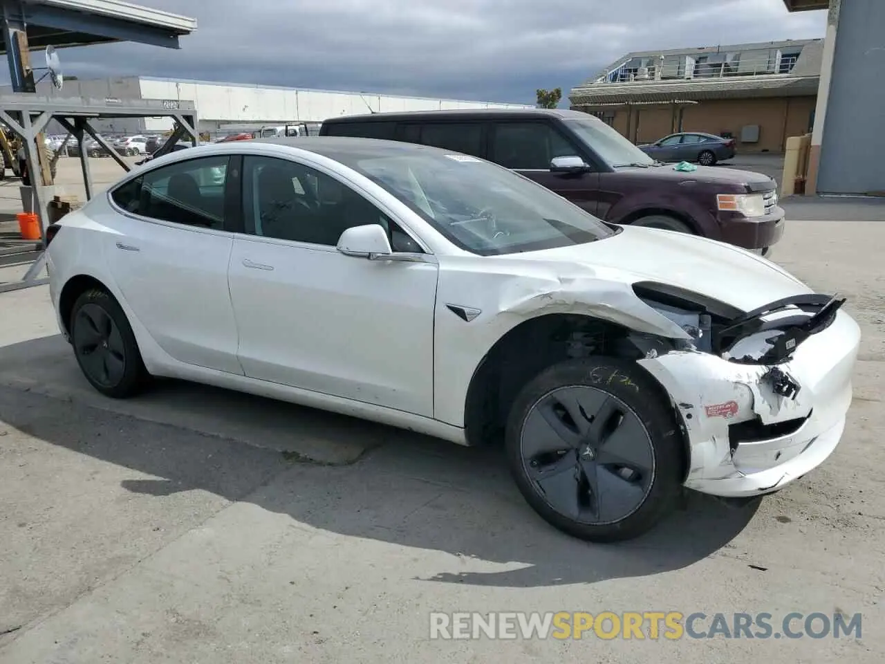 4 Photograph of a damaged car 5YJ3E1EA4LF740159 TESLA MODEL 3 2020