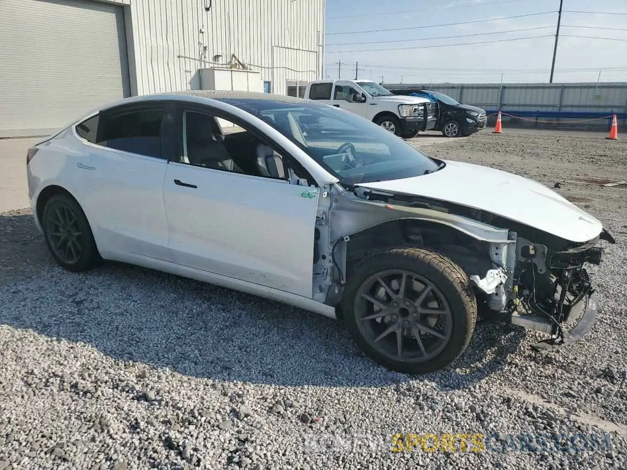 4 Photograph of a damaged car 5YJ3E1EA4LF740341 TESLA MODEL 3 2020