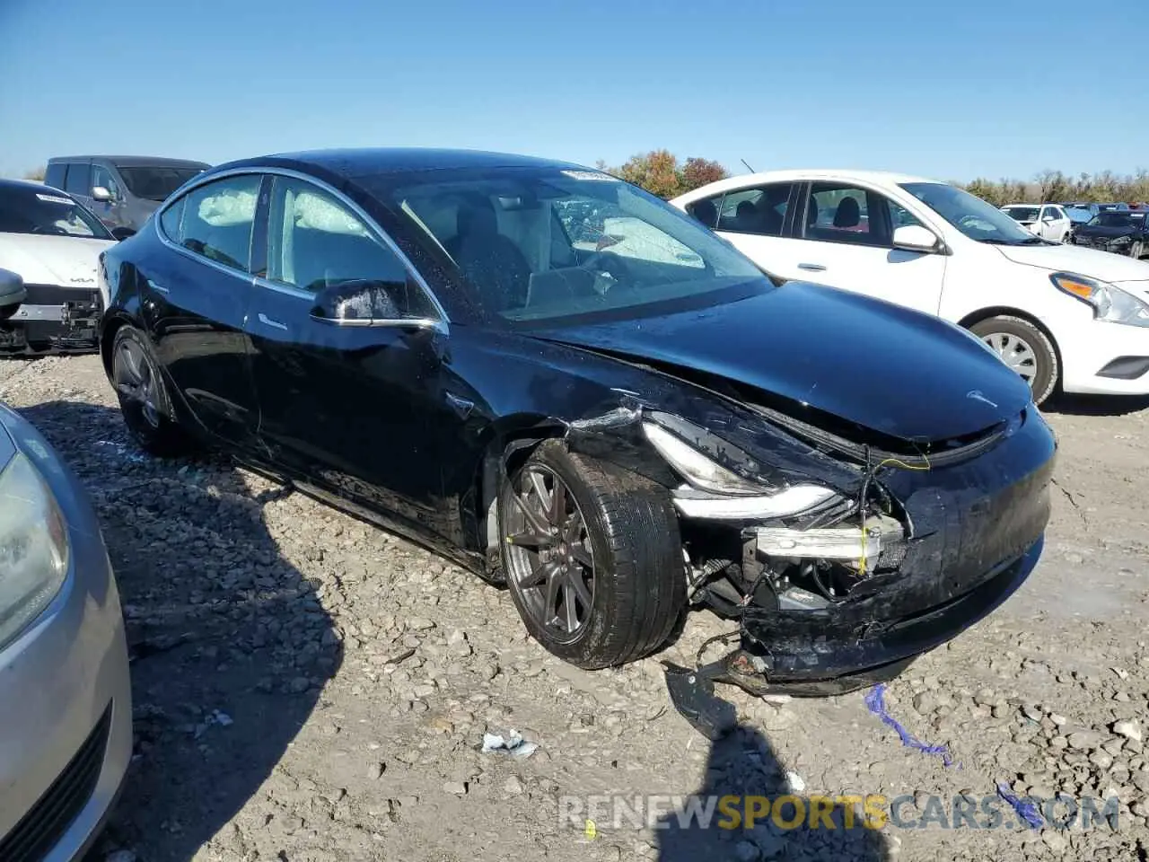 4 Photograph of a damaged car 5YJ3E1EA4LF745474 TESLA MODEL 3 2020
