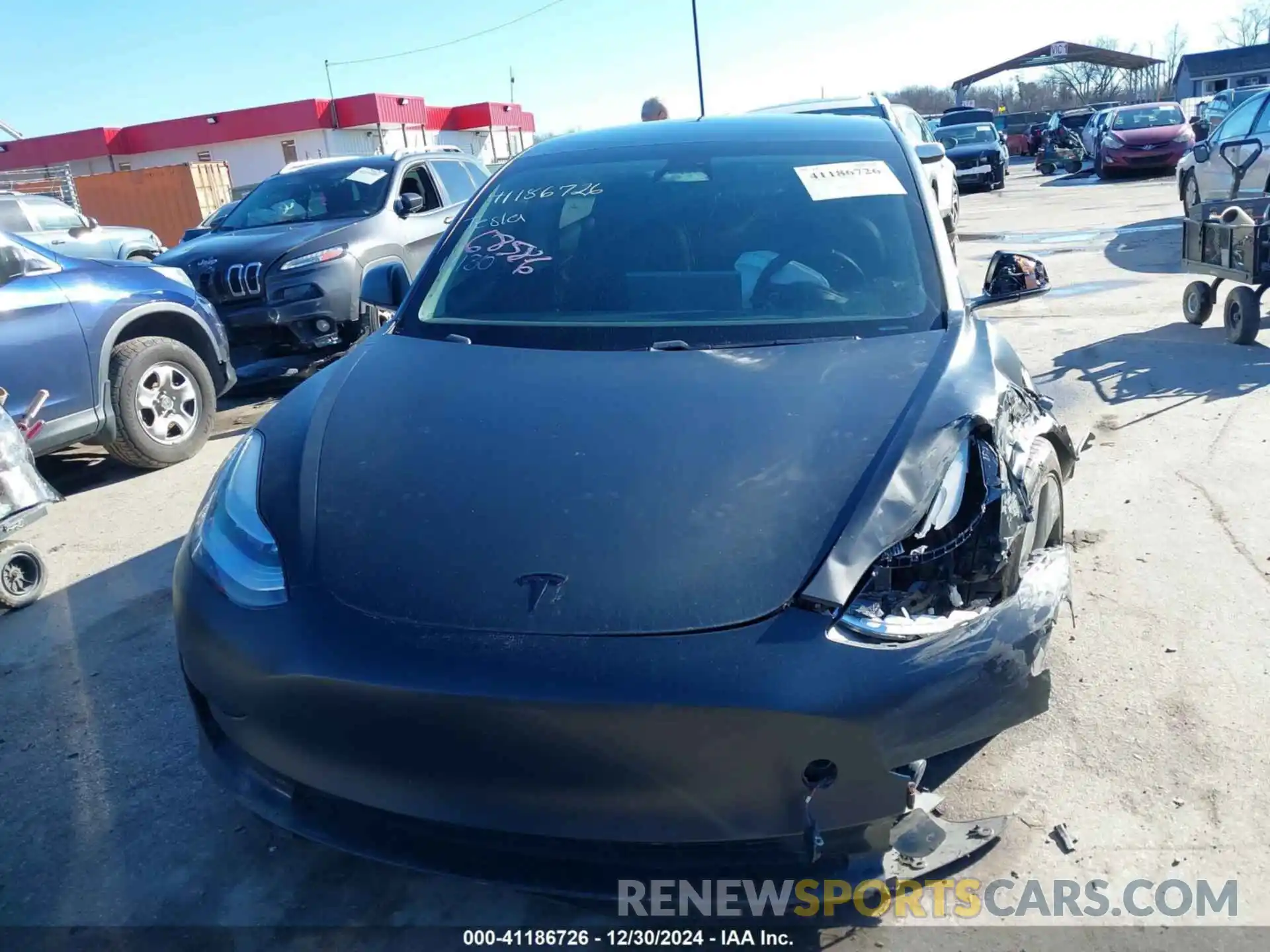 12 Photograph of a damaged car 5YJ3E1EA4LF745491 TESLA MODEL 3 2020