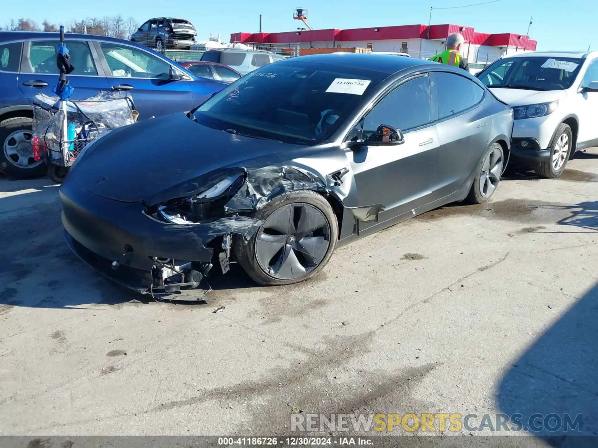 2 Photograph of a damaged car 5YJ3E1EA4LF745491 TESLA MODEL 3 2020