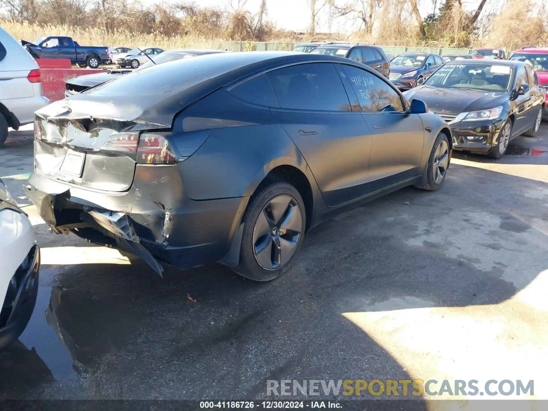 4 Photograph of a damaged car 5YJ3E1EA4LF745491 TESLA MODEL 3 2020