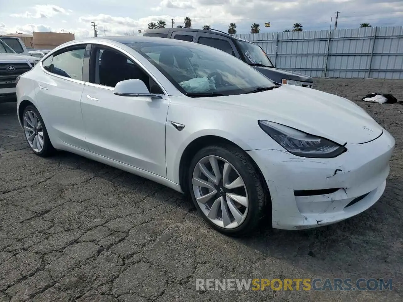 4 Photograph of a damaged car 5YJ3E1EA4LF745877 TESLA MODEL 3 2020