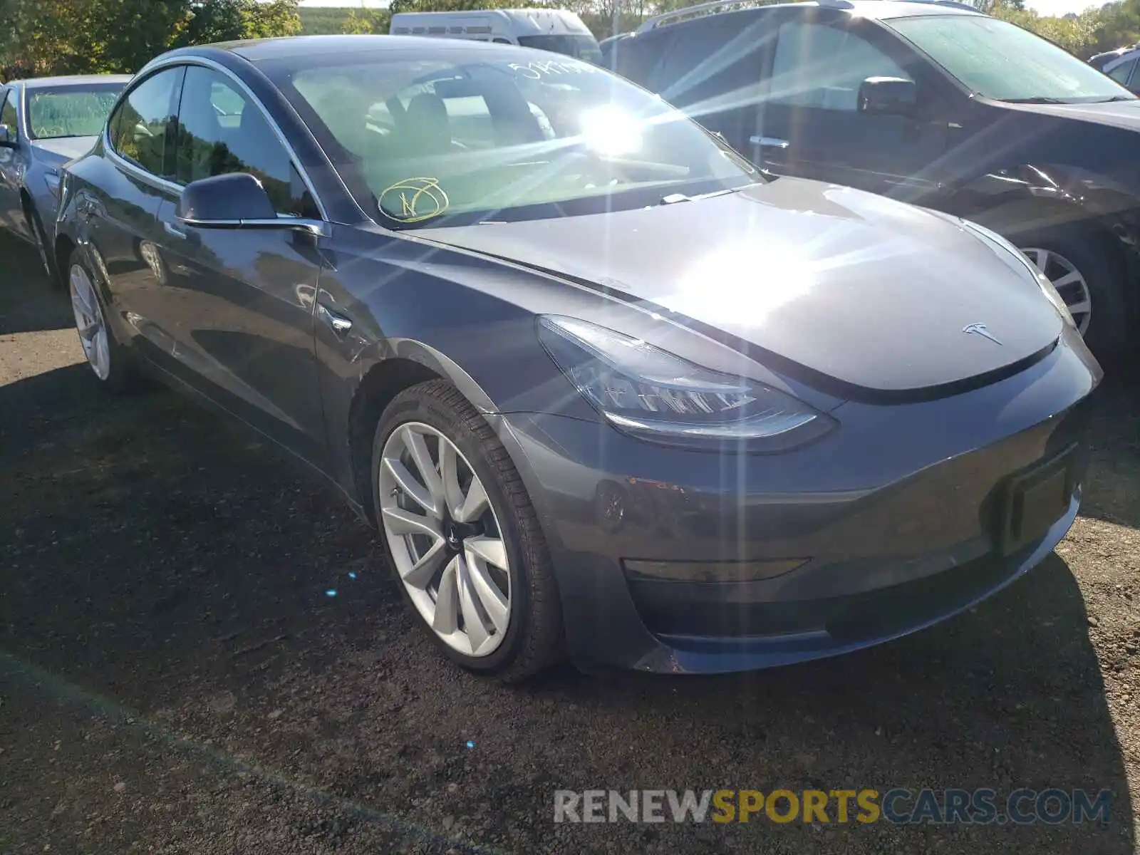 1 Photograph of a damaged car 5YJ3E1EA4LF785604 TESLA MODEL 3 2020