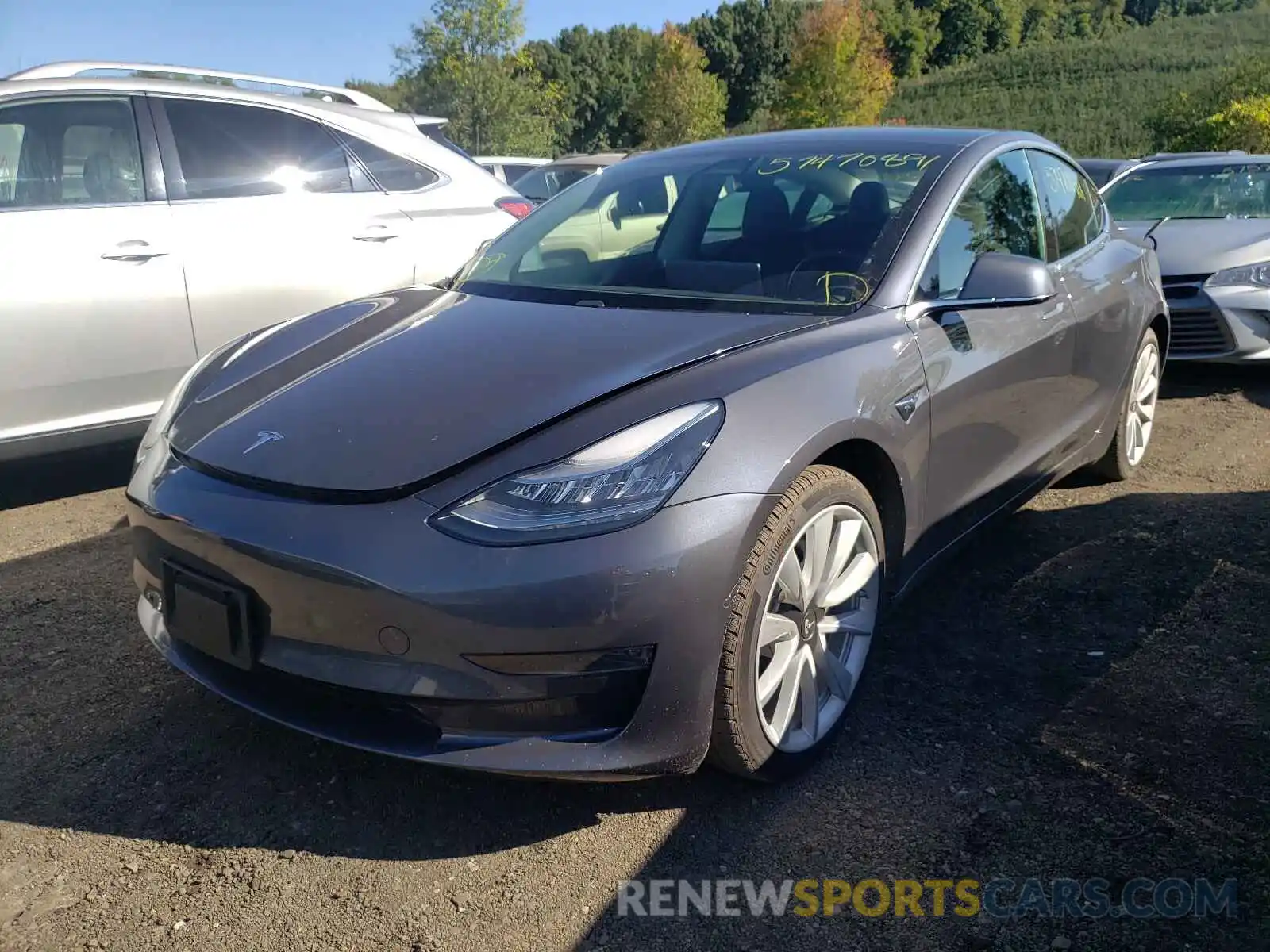 2 Photograph of a damaged car 5YJ3E1EA4LF785604 TESLA MODEL 3 2020