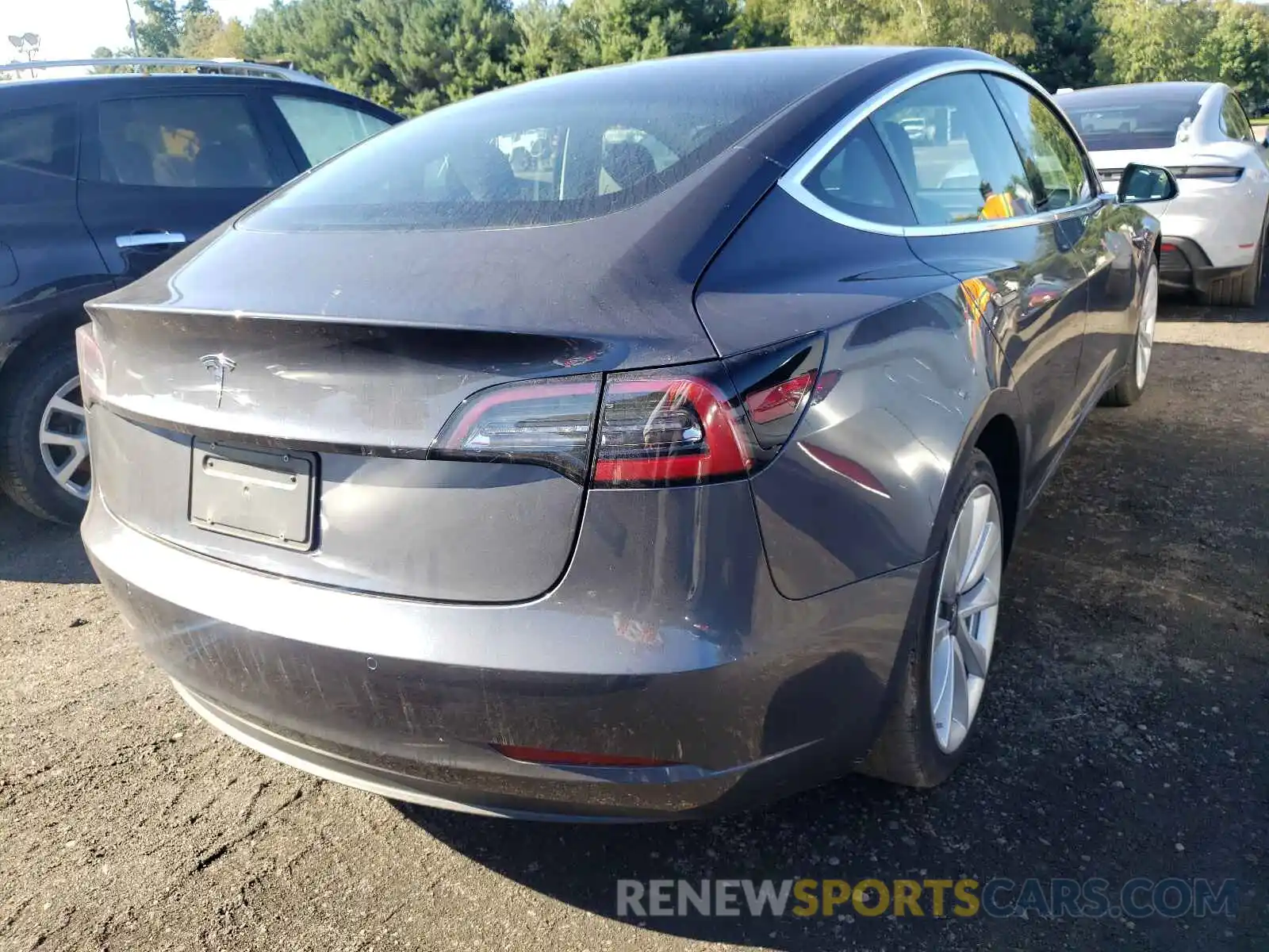 4 Photograph of a damaged car 5YJ3E1EA4LF785604 TESLA MODEL 3 2020