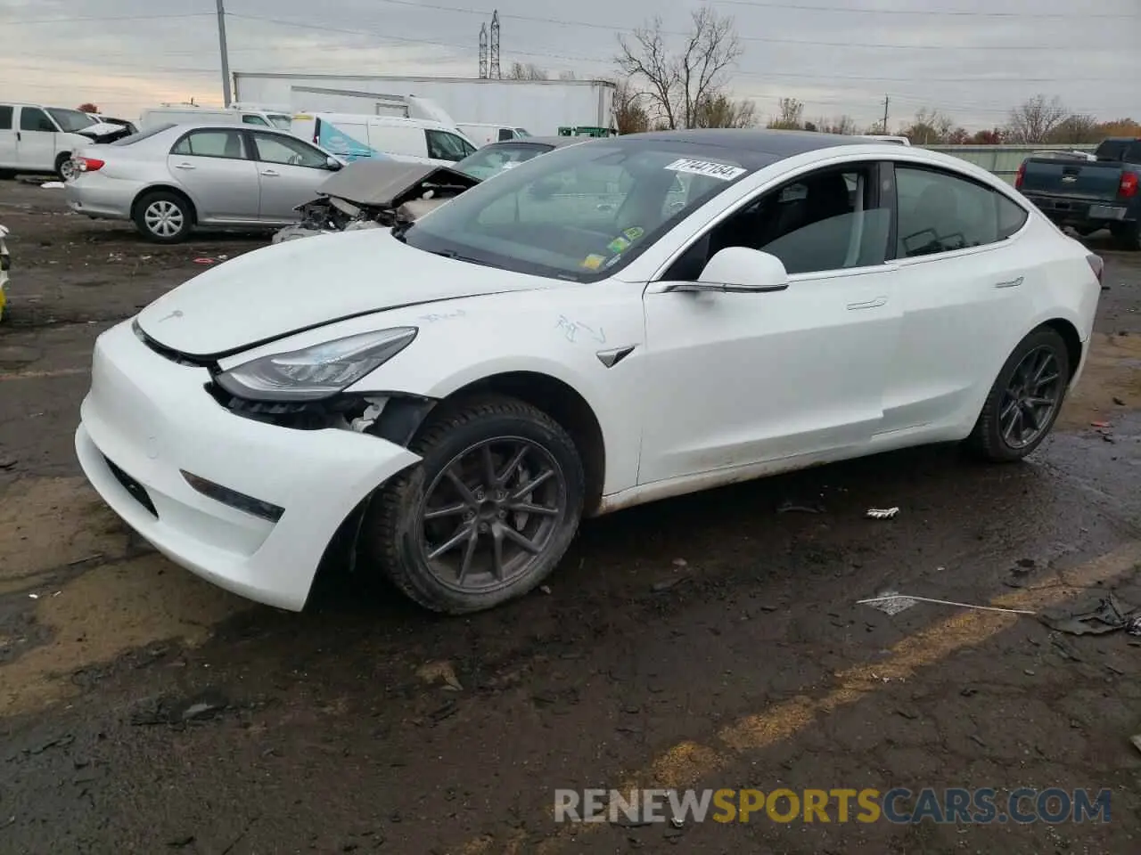 1 Photograph of a damaged car 5YJ3E1EA4LF792794 TESLA MODEL 3 2020