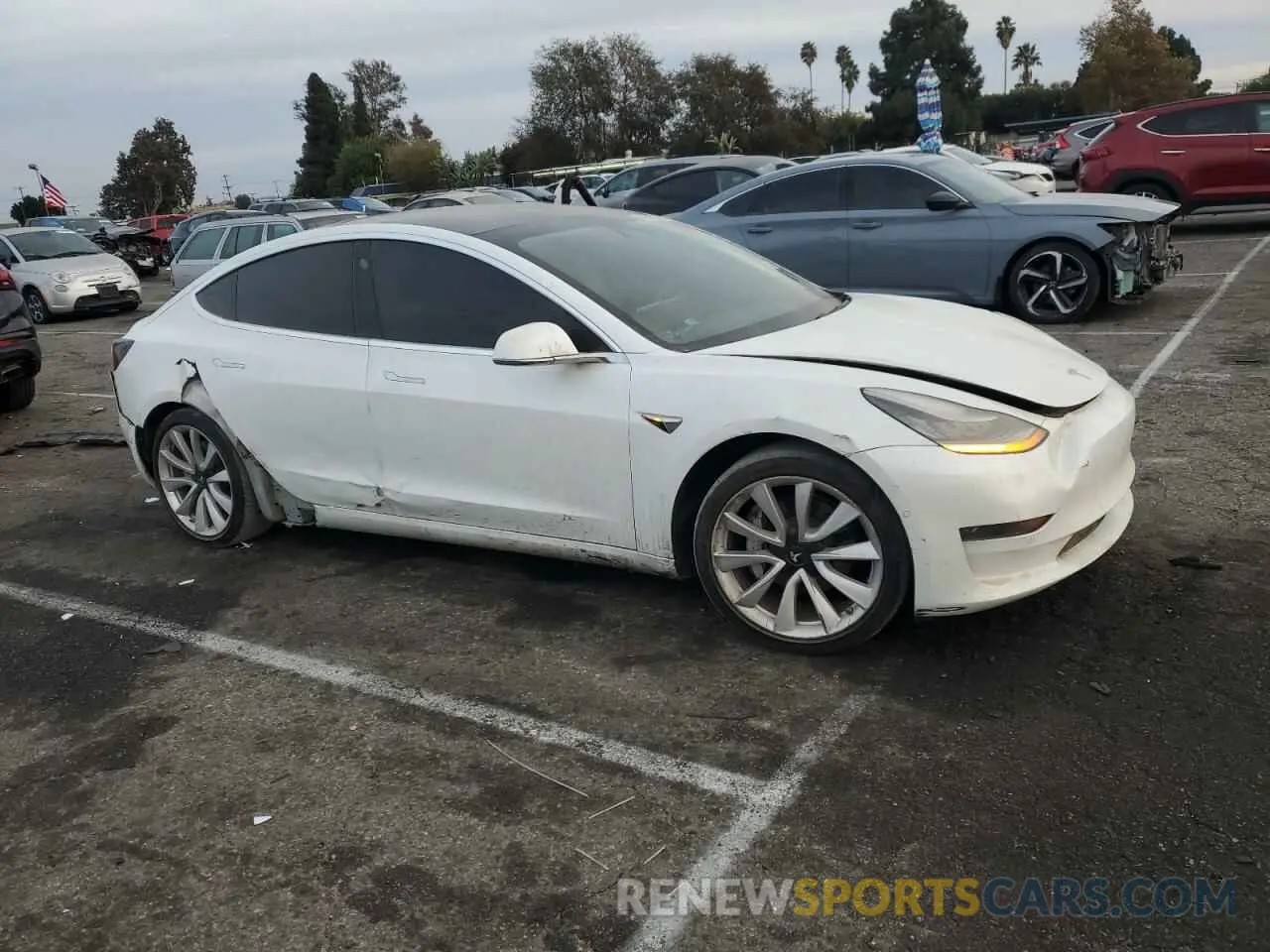 4 Photograph of a damaged car 5YJ3E1EA4LF806421 TESLA MODEL 3 2020
