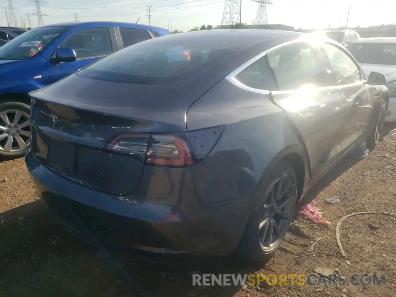 4 Photograph of a damaged car 5YJ3E1EA5LF495906 TESLA MODEL 3 2020