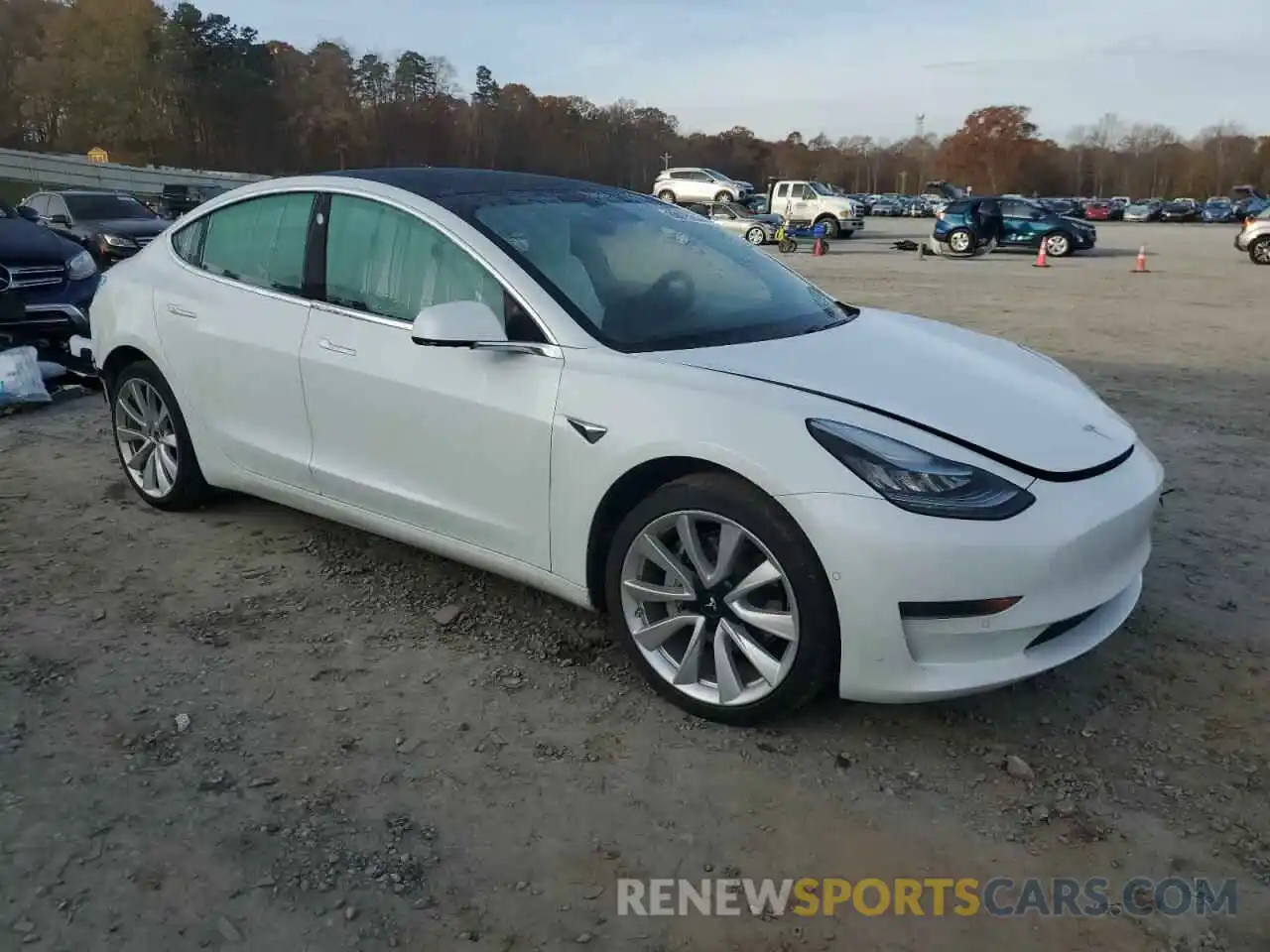 4 Photograph of a damaged car 5YJ3E1EA5LF509903 TESLA MODEL 3 2020