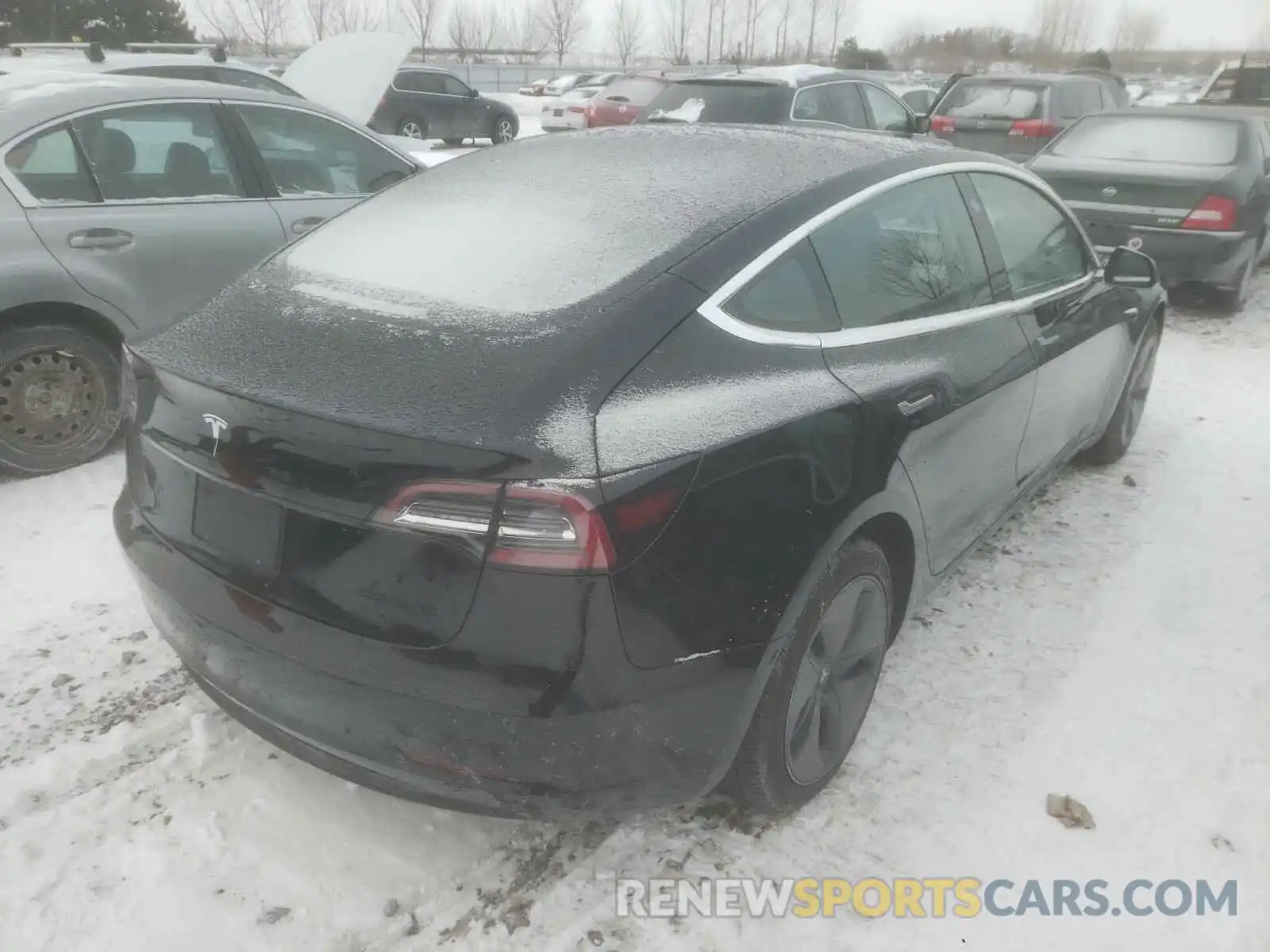 4 Photograph of a damaged car 5YJ3E1EA5LF540018 TESLA MODEL 3 2020