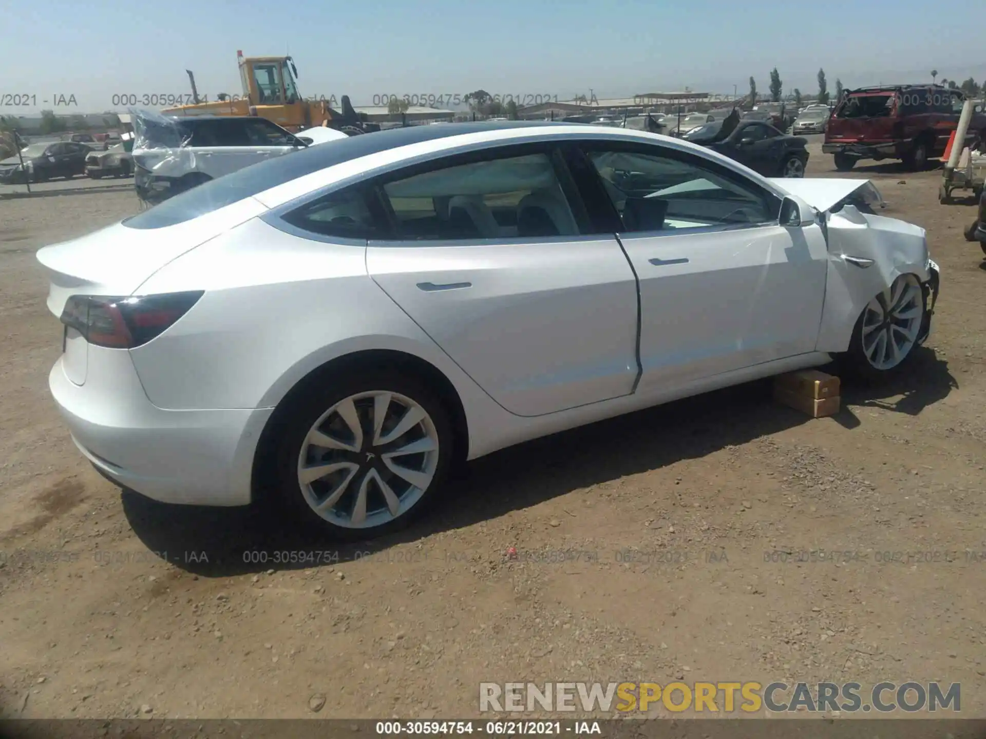 4 Photograph of a damaged car 5YJ3E1EA5LF615994 TESLA MODEL 3 2020