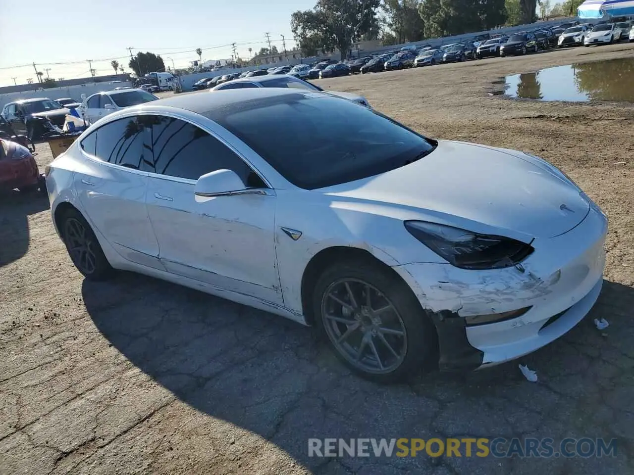 4 Photograph of a damaged car 5YJ3E1EA5LF660417 TESLA MODEL 3 2020