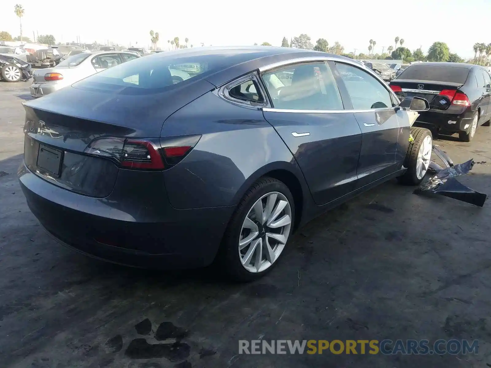 4 Photograph of a damaged car 5YJ3E1EA5LF661177 TESLA MODEL 3 2020