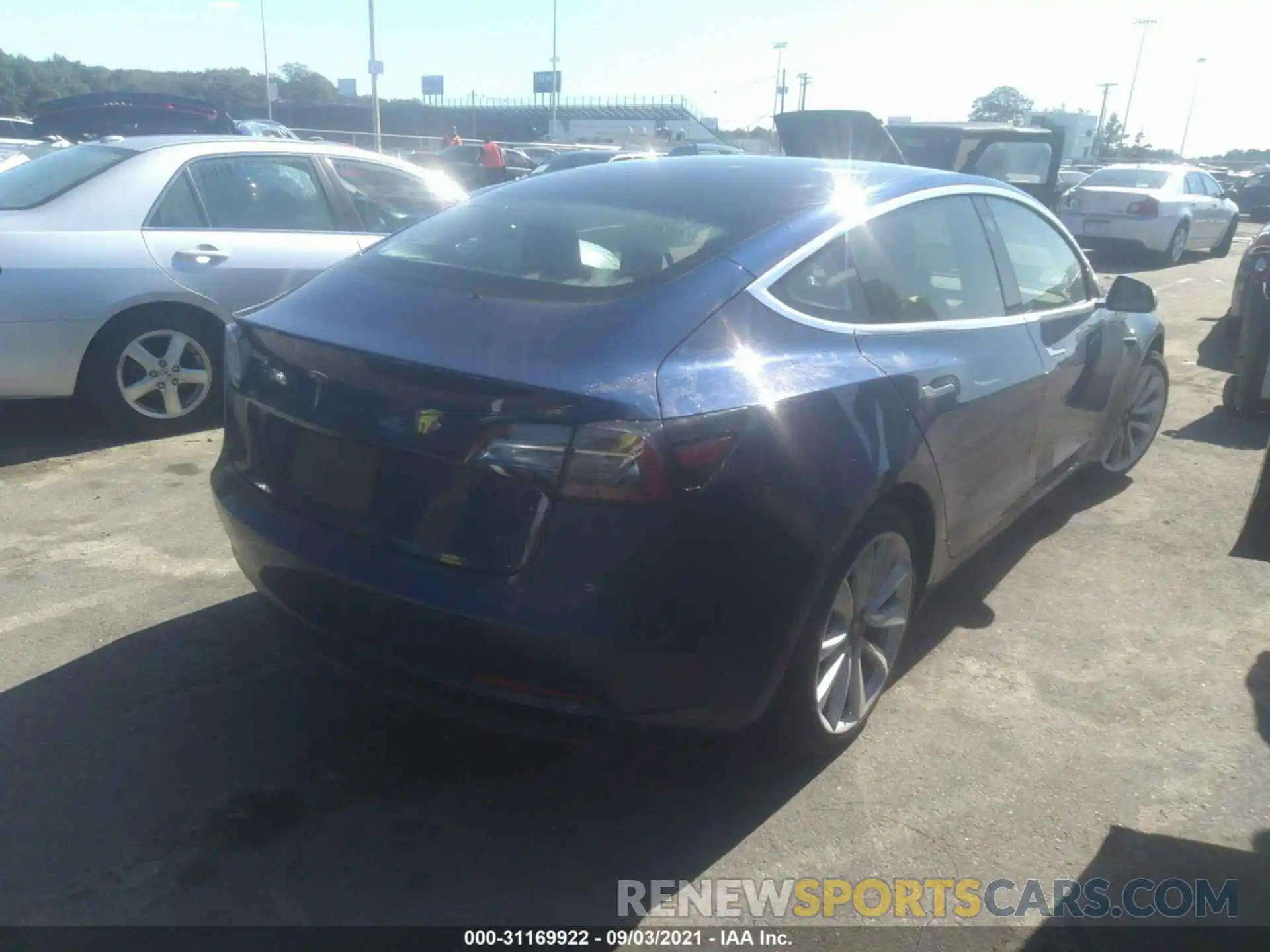 4 Photograph of a damaged car 5YJ3E1EA5LF661308 TESLA MODEL 3 2020