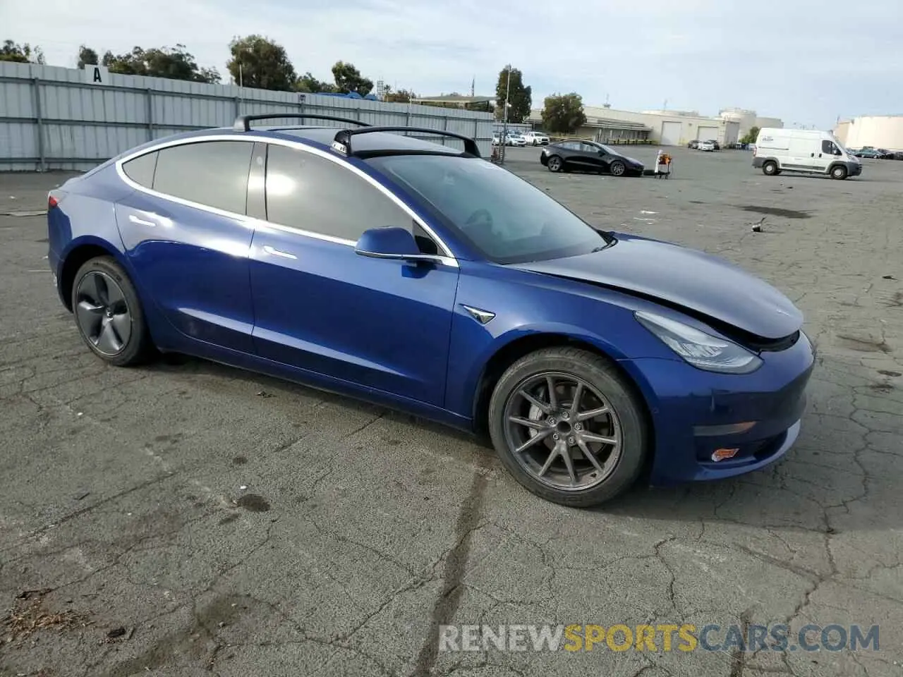 4 Photograph of a damaged car 5YJ3E1EA5LF707137 TESLA MODEL 3 2020