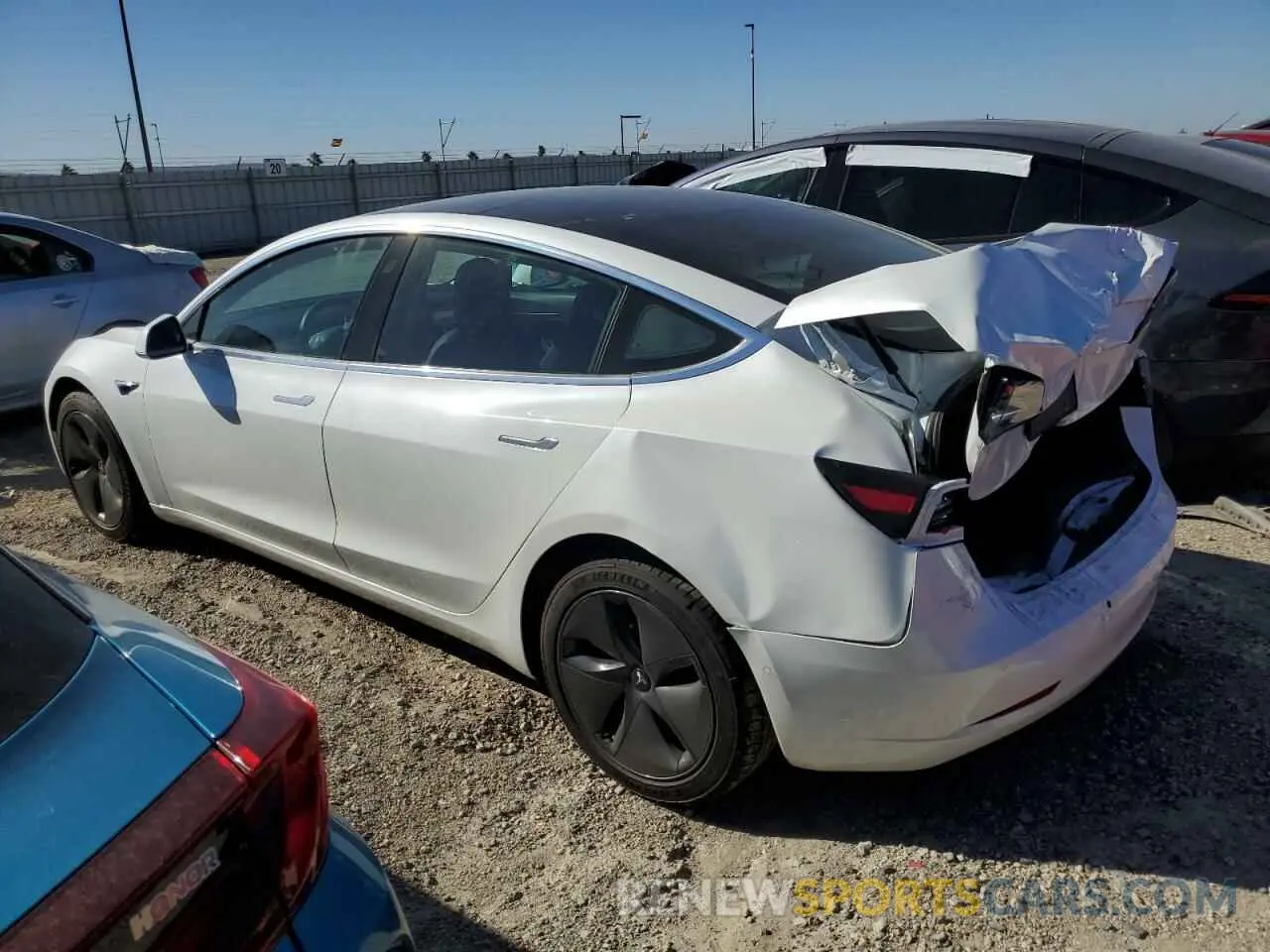 2 Photograph of a damaged car 5YJ3E1EA5LF707235 TESLA MODEL 3 2020