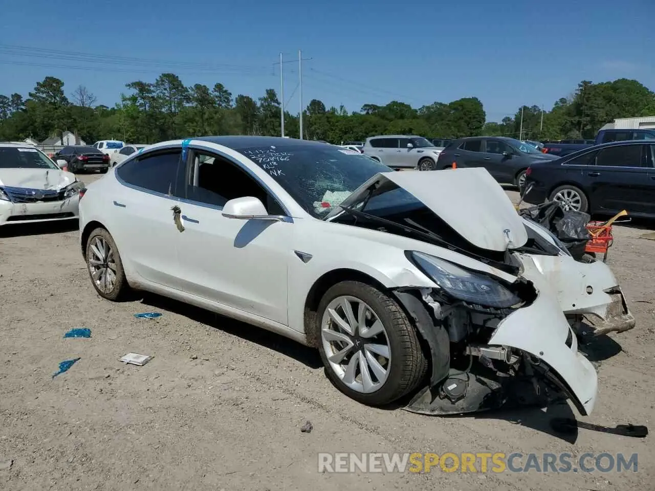 4 Photograph of a damaged car 5YJ3E1EA5LF708966 TESLA MODEL 3 2020