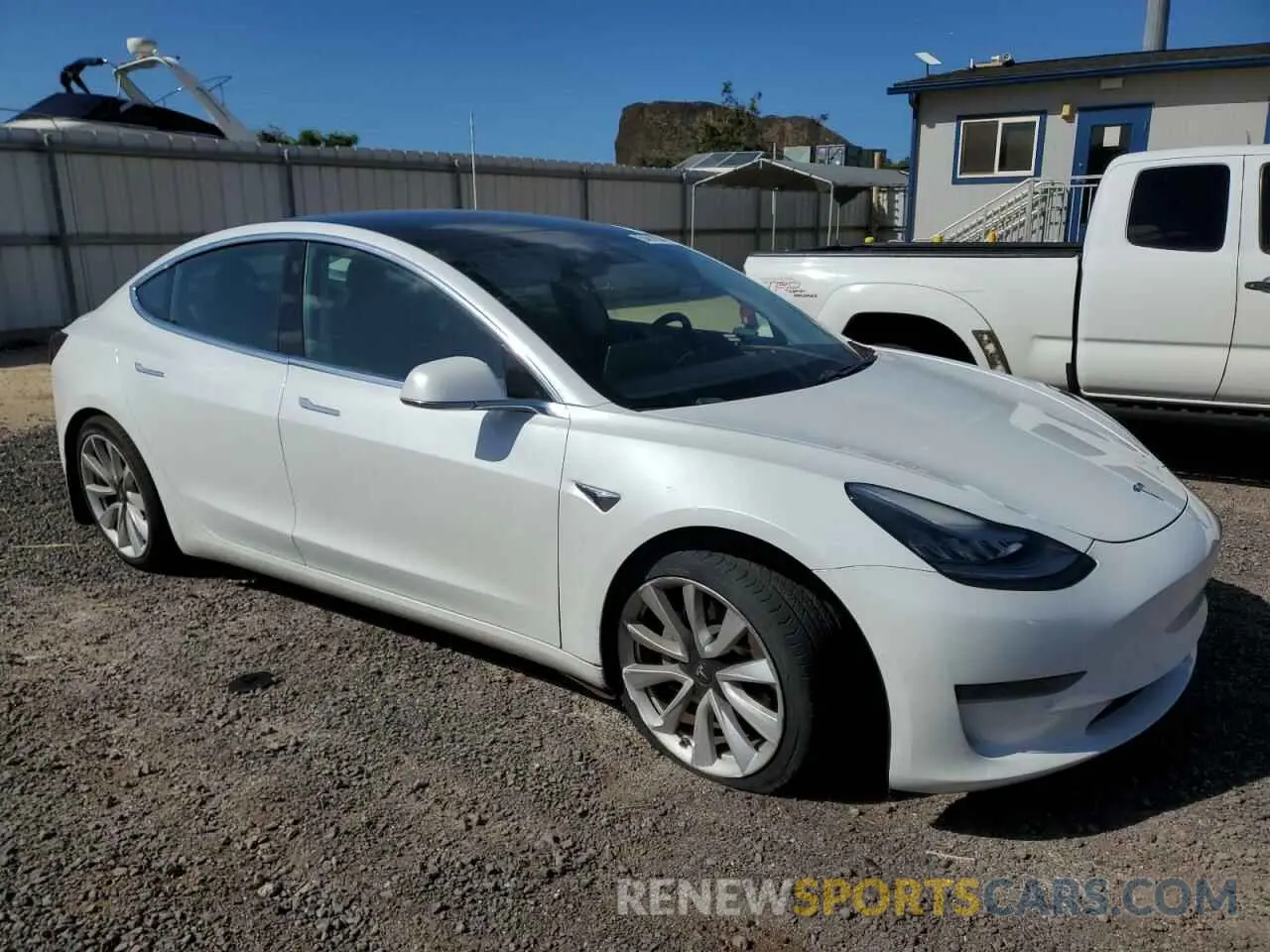 4 Photograph of a damaged car 5YJ3E1EA5LF709003 TESLA MODEL 3 2020