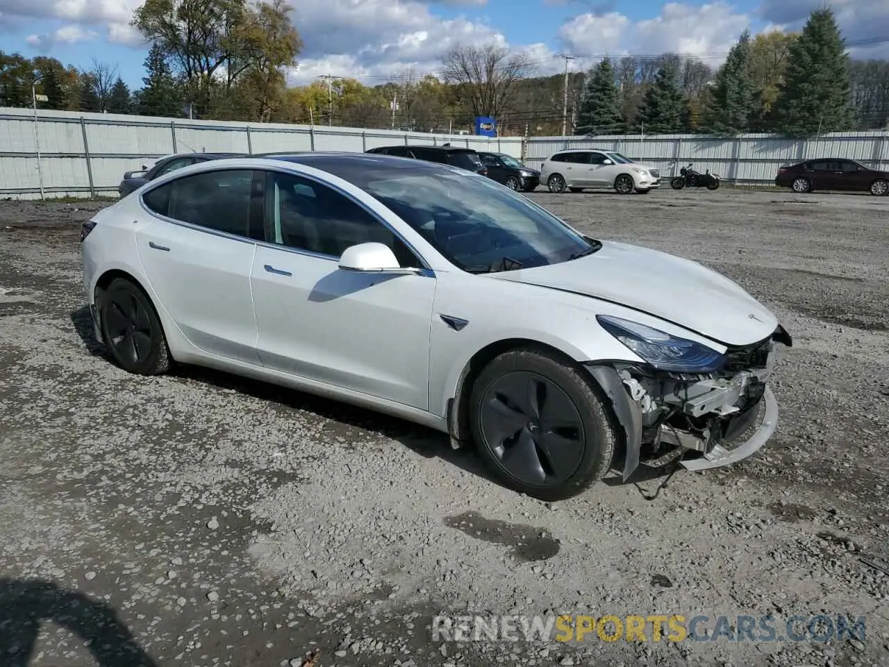 4 Photograph of a damaged car 5YJ3E1EA5LF737058 TESLA MODEL 3 2020