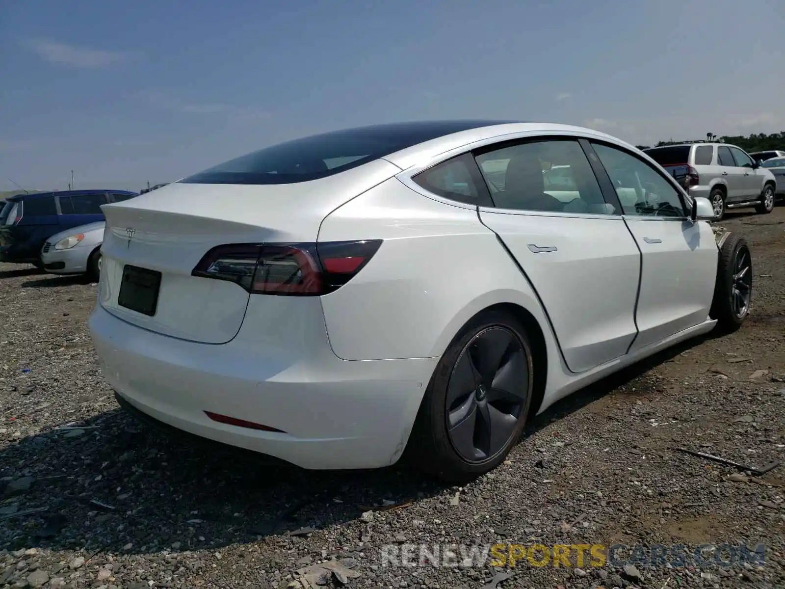 4 Photograph of a damaged car 5YJ3E1EA5LF737352 TESLA MODEL 3 2020