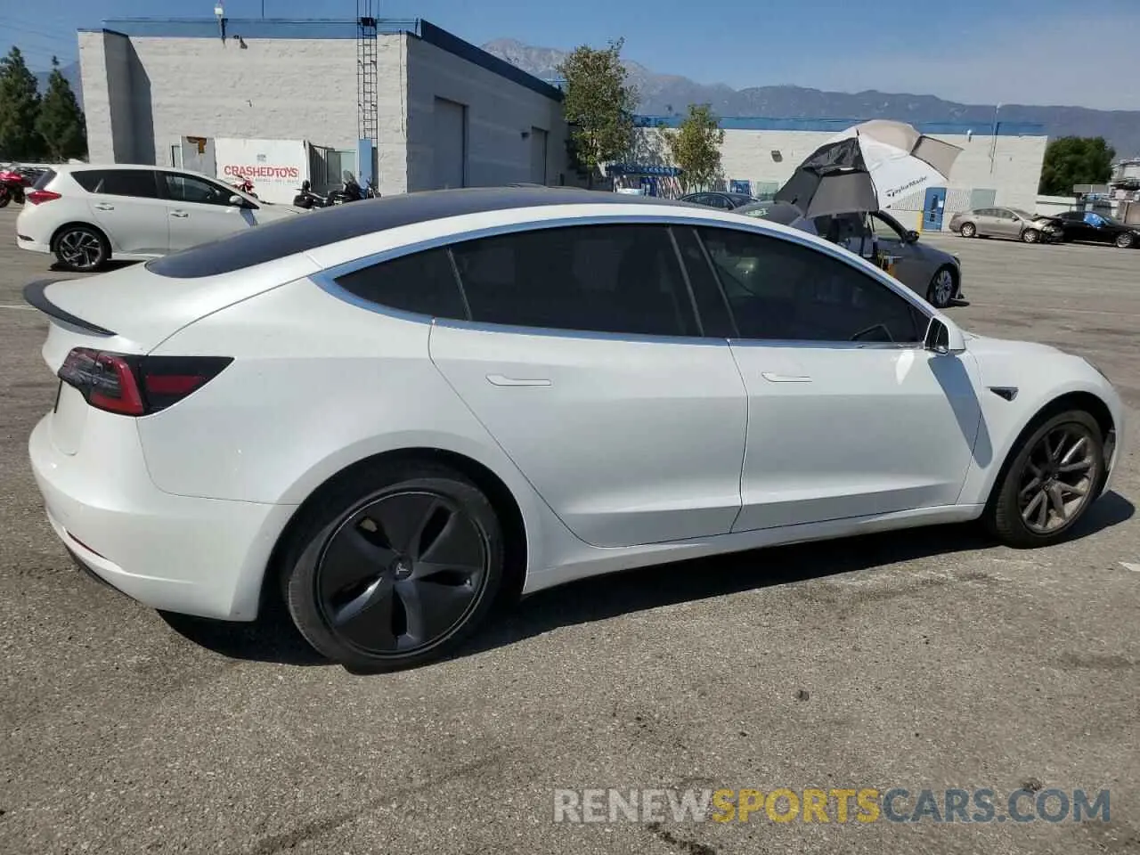 3 Photograph of a damaged car 5YJ3E1EA5LF740154 TESLA MODEL 3 2020